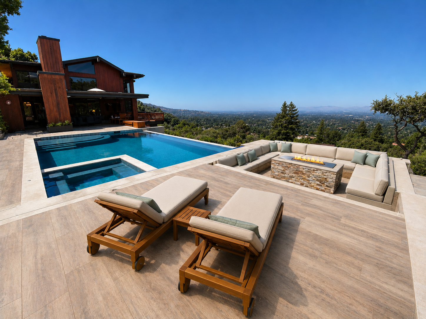 Luxury backyard with a swimming pool, lounge chairs, and a view of a city and mountains in the distance under a clear blue sky.