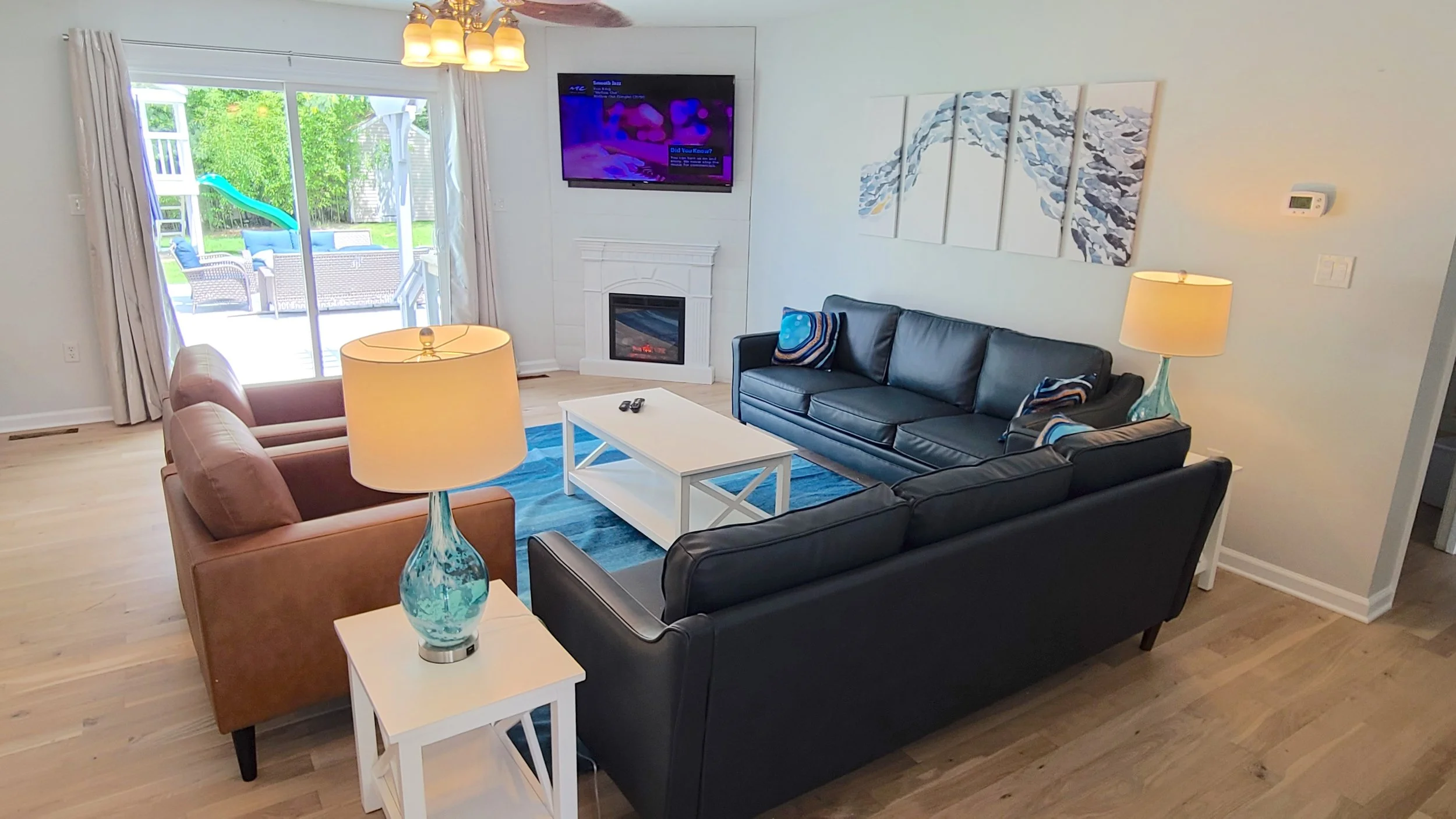 #5 Family room w fireplace & lamps.jpg