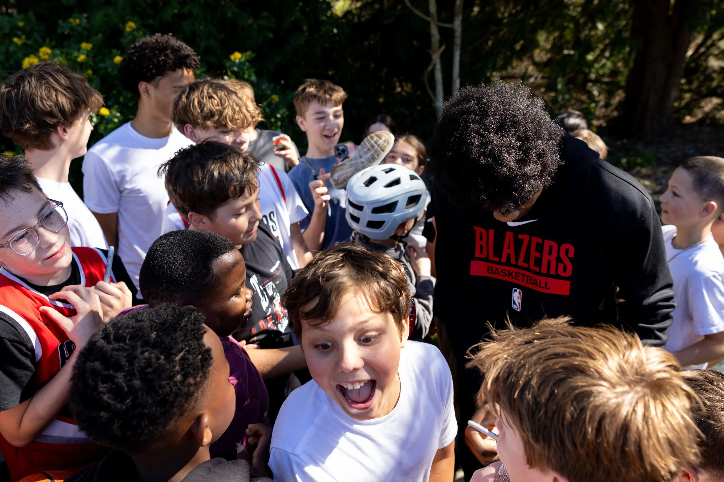 Scoot Henderson interacting with fans during the daimler tree planting day on April 3, 2026. Ian Cox / Trail Blazers