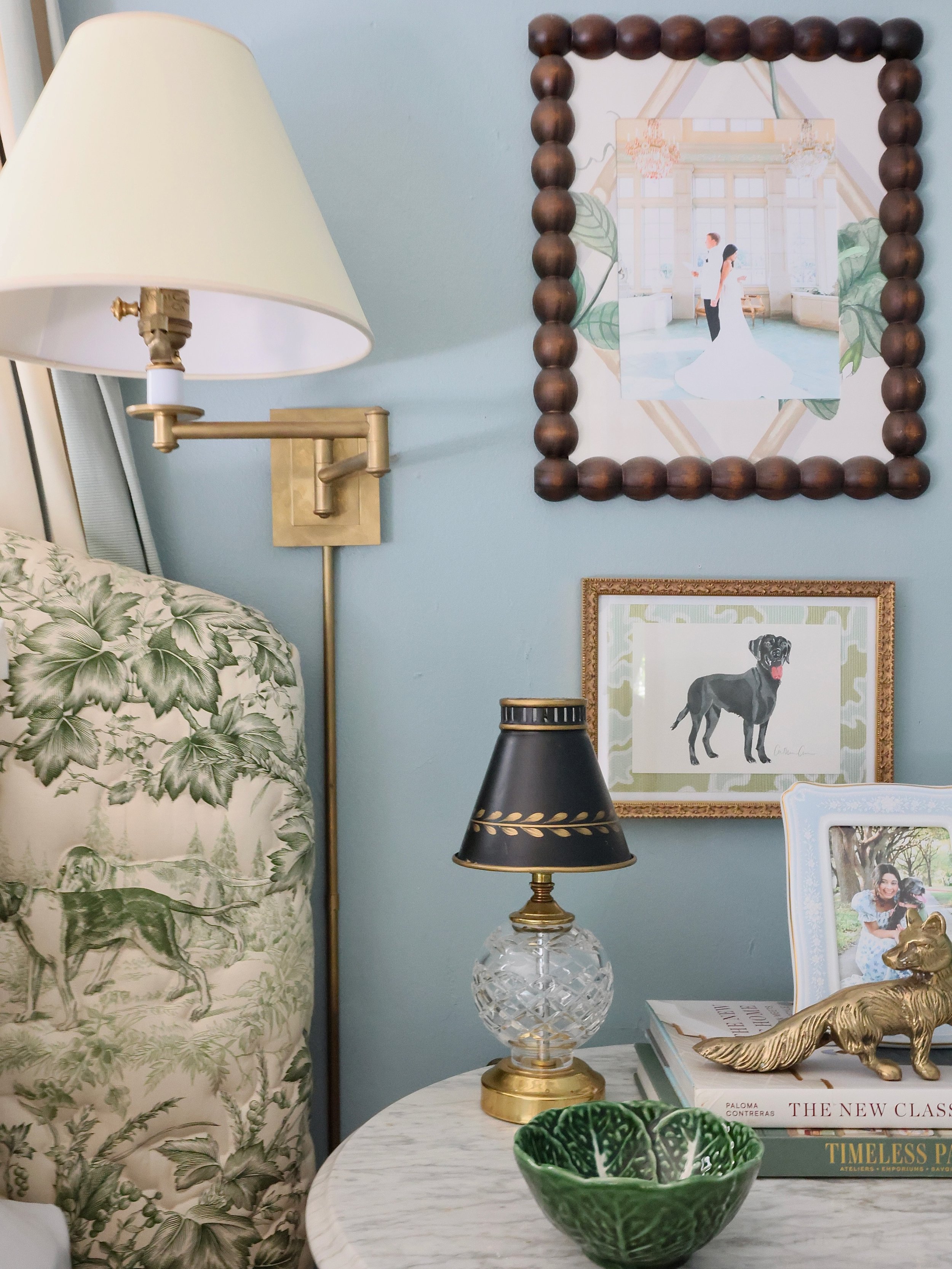 A little nightstand layering. Save this for your next re-arrangement. 🛏️🖼️🪴

&bull;Stack of books 
&bull;Layered art work or photographs hung on the wall
&bull;Vintage bowl to hold essentials (hello my chapstick)
&bull;Favorite photograph in a pic