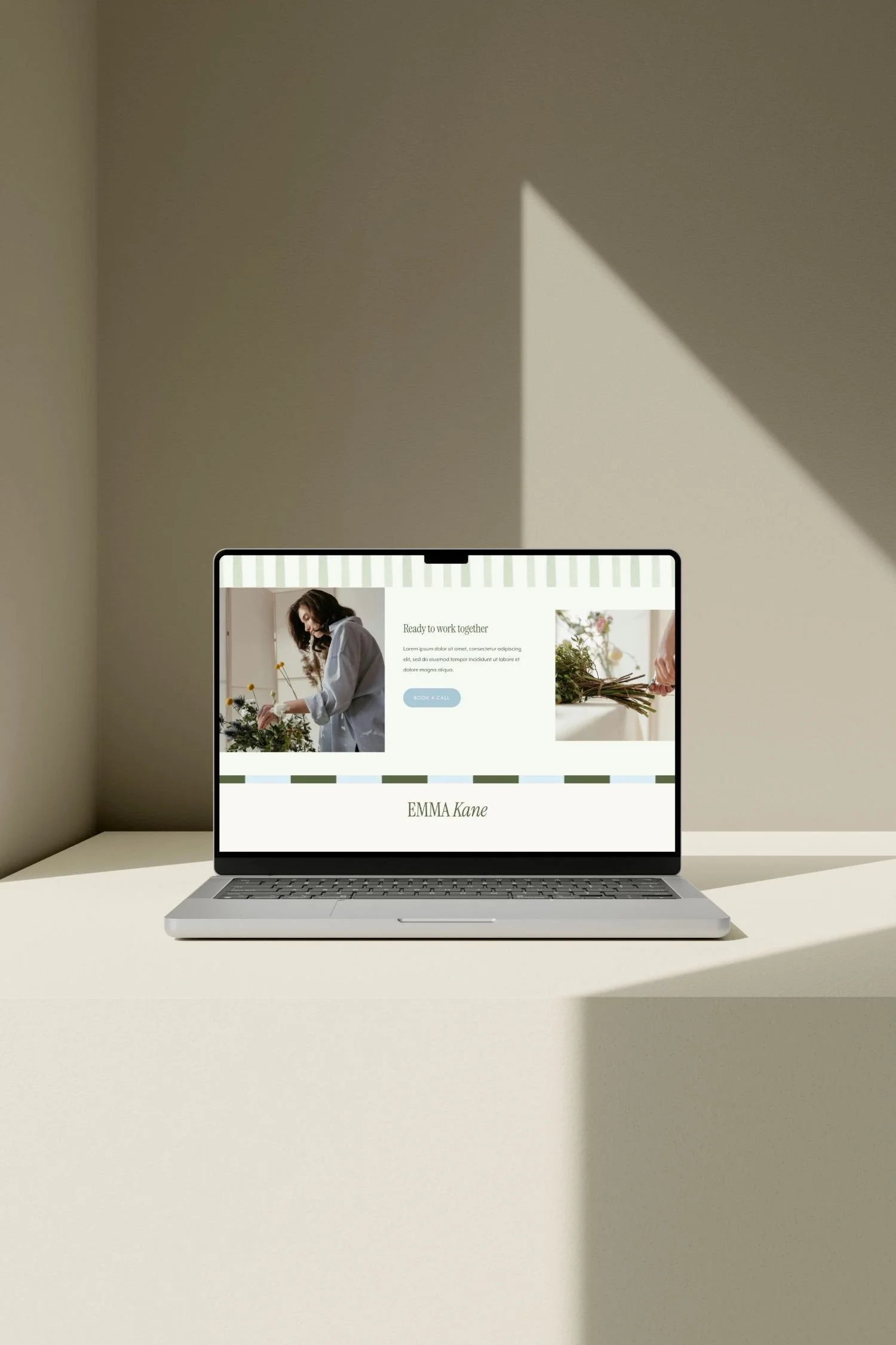 Laptop on neutral background displaying Social Magpie Design CoSquarespace Template