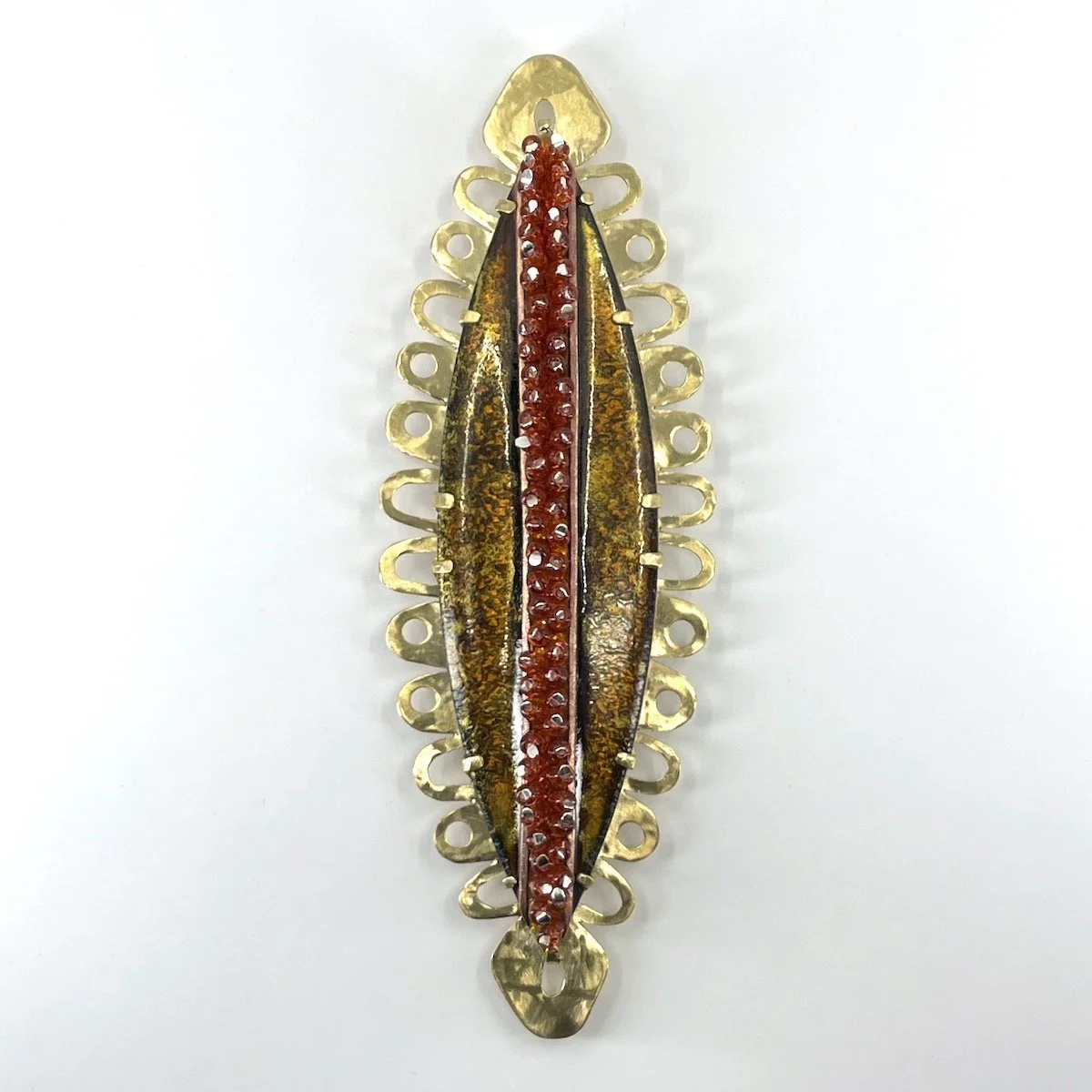Brown and red marquise enamel brooch with pierced lacy scalloped brass setting