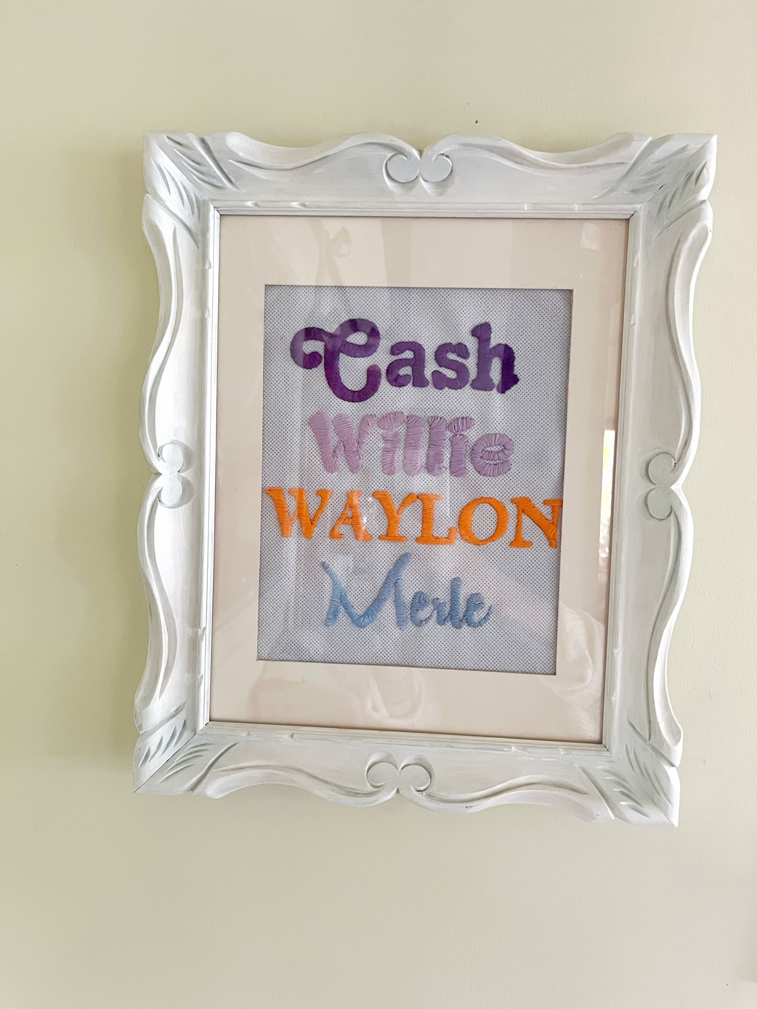 "Country Boys" hand stitched in vintage frame.