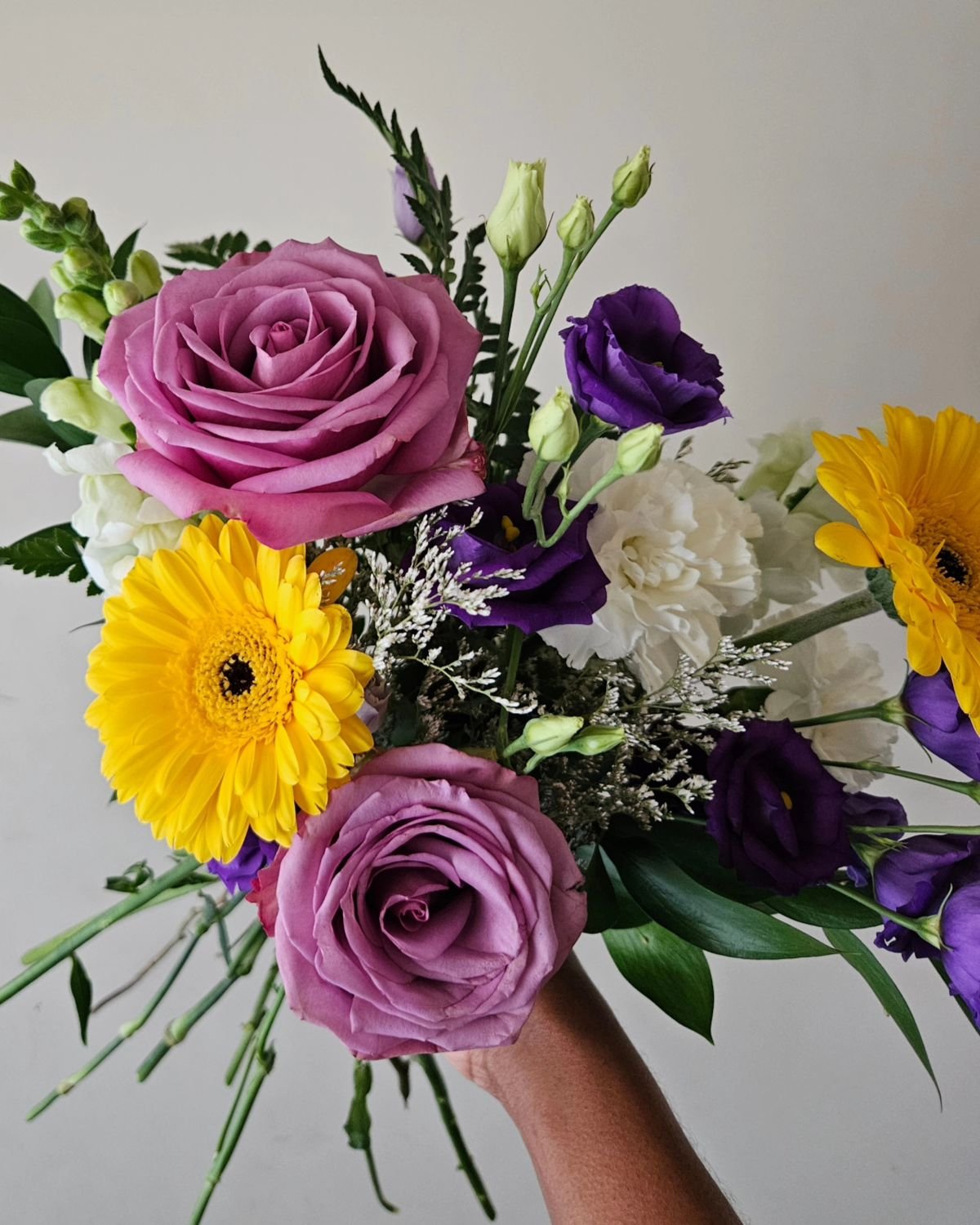 Flower Play: Hand-tied bouquet  with fresh blooms delivered by @bears_blooms 

Ingredients 
Lisianthus
Gerbera daisy
Snapdragon 
Rose
Carnation

#rebelliousstate #rebelliousblooms #torontoflorist #gtaflorist #blackowned #femaleowned #flowerstagram #f