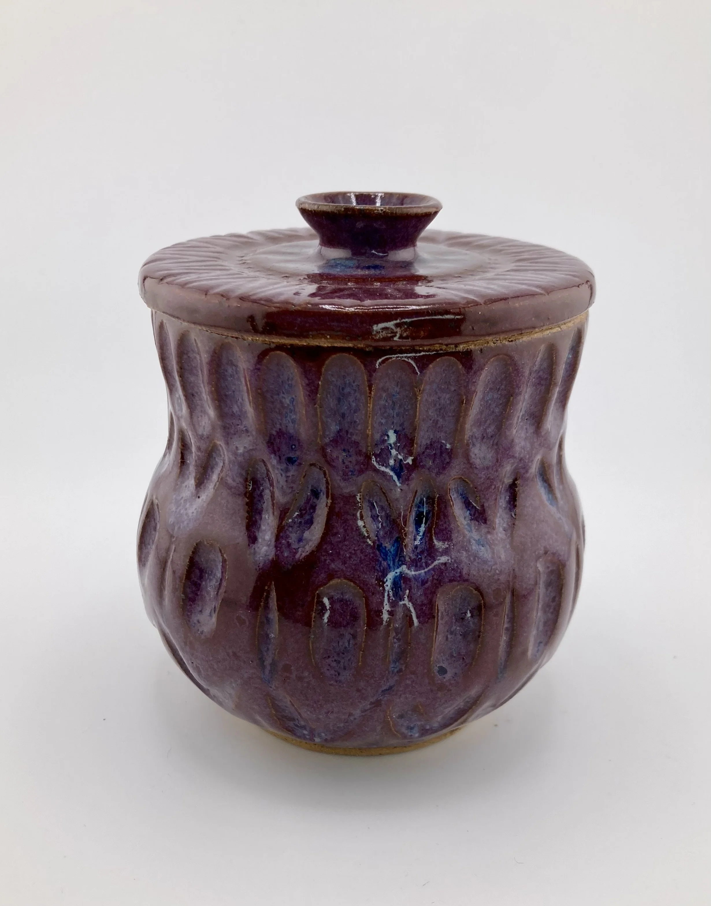 Maroon carved jar
