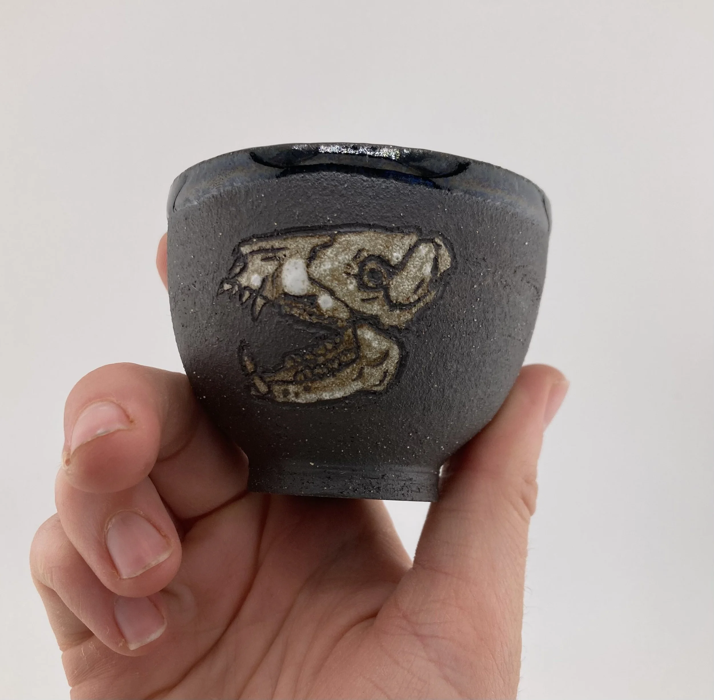 Two javelinas shot glass