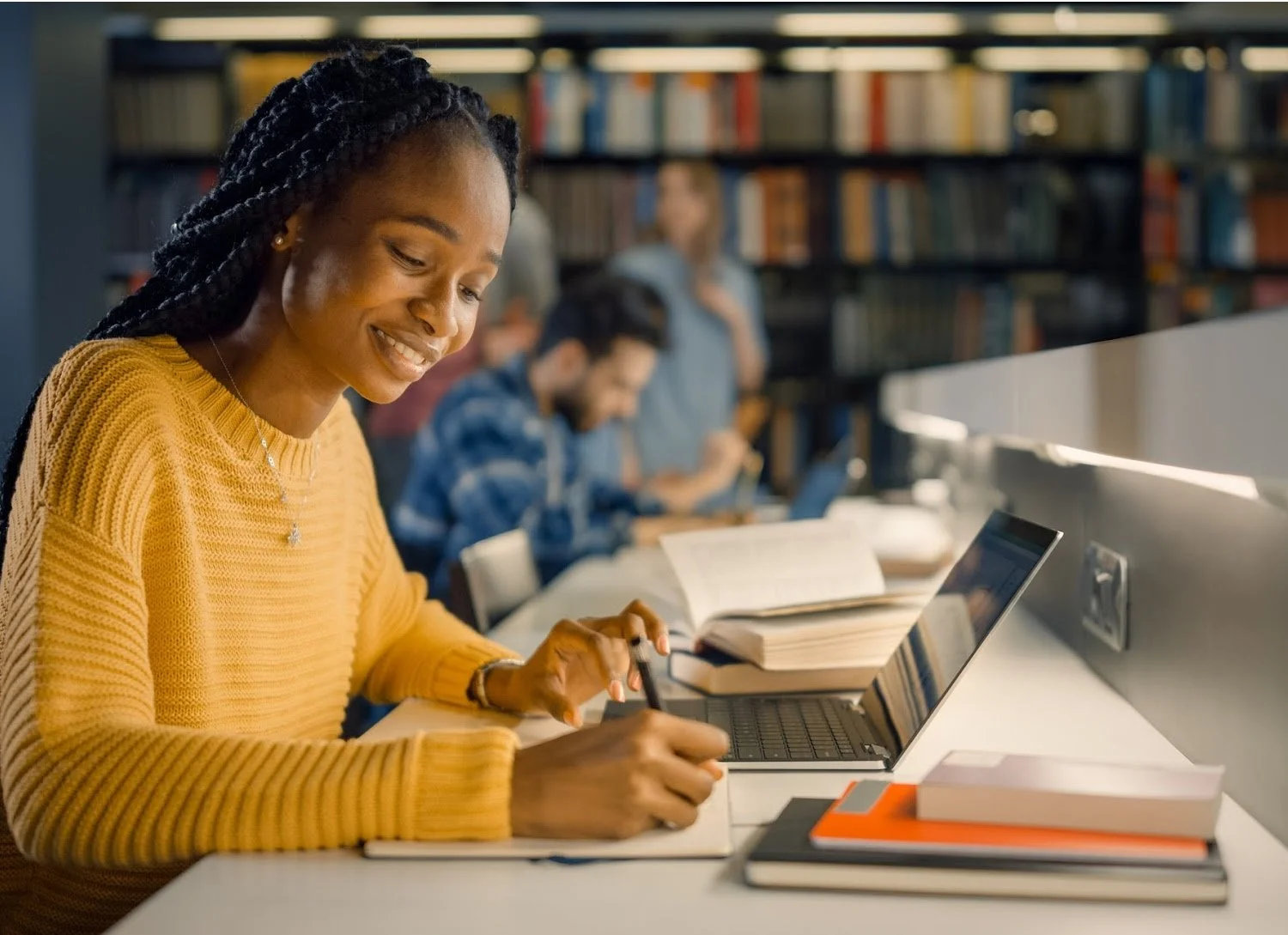 Student with test anxiety writes out unhelpful thoughts to overcome test anxiety.