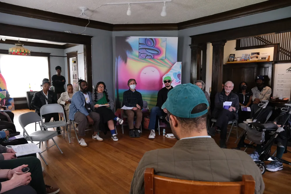  Simon Benjamin speaks to an audience during Wa Na Wari Sunday Dinner screenings.  