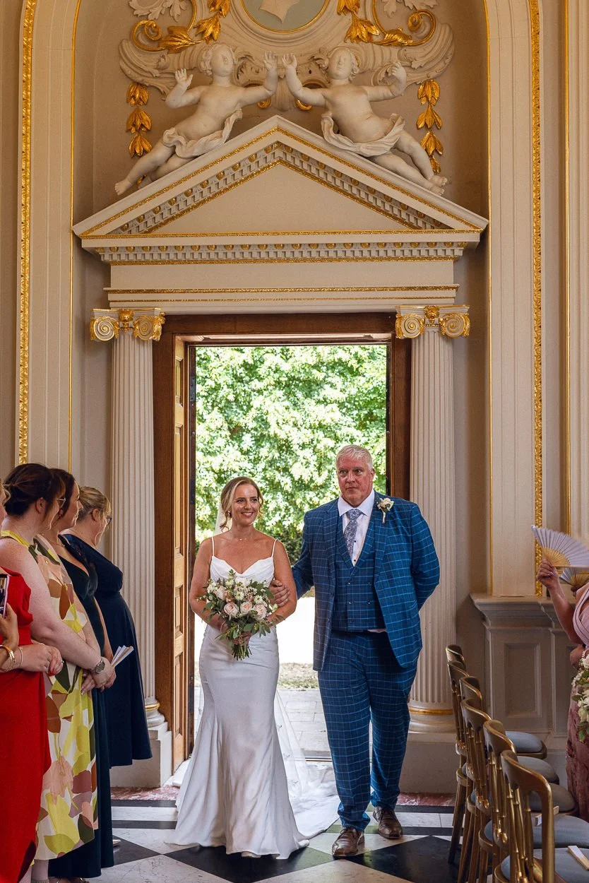 Bride enters the ceremony room at Orleans House Gallery