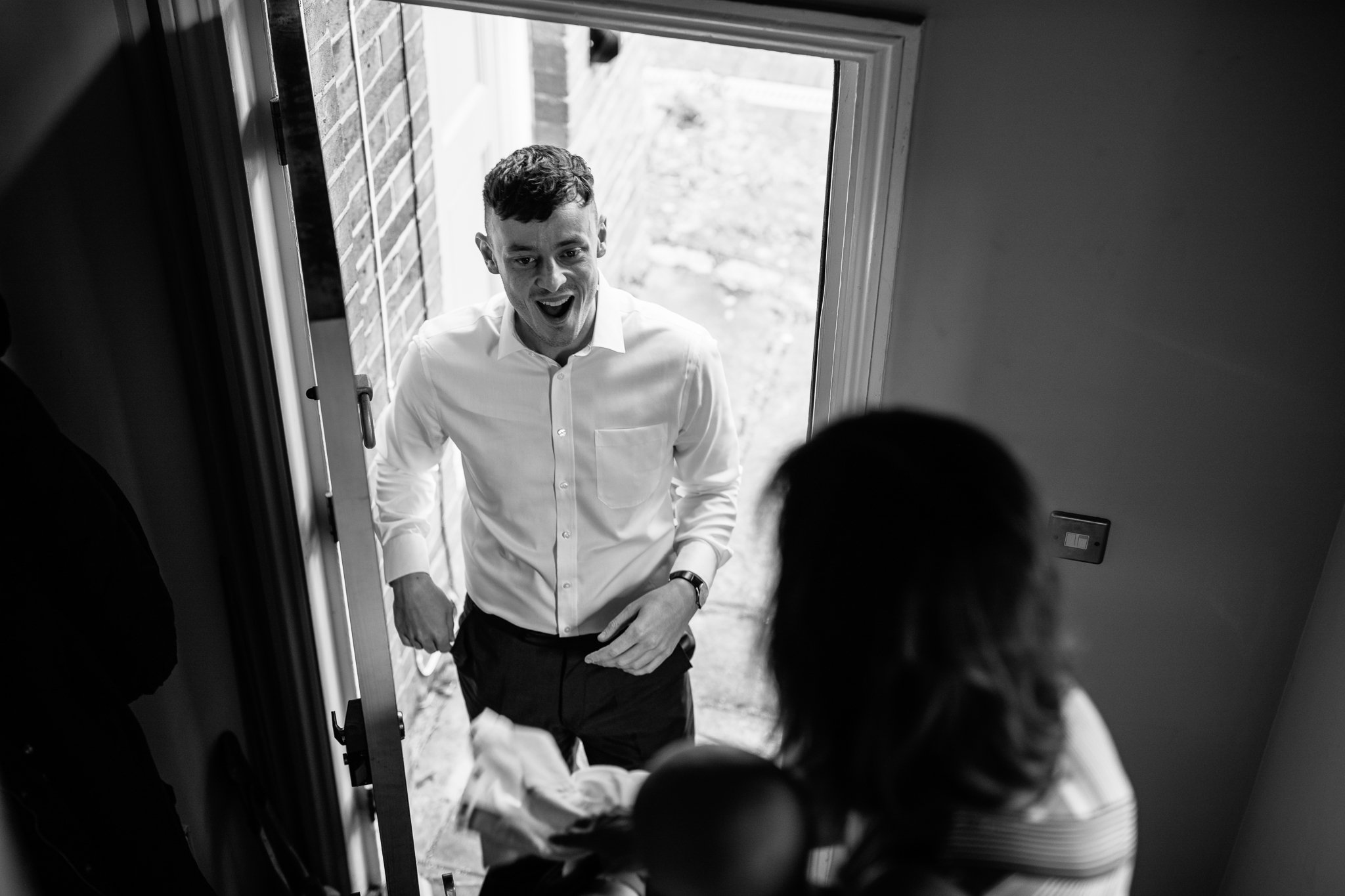  Groom looking at his son. 