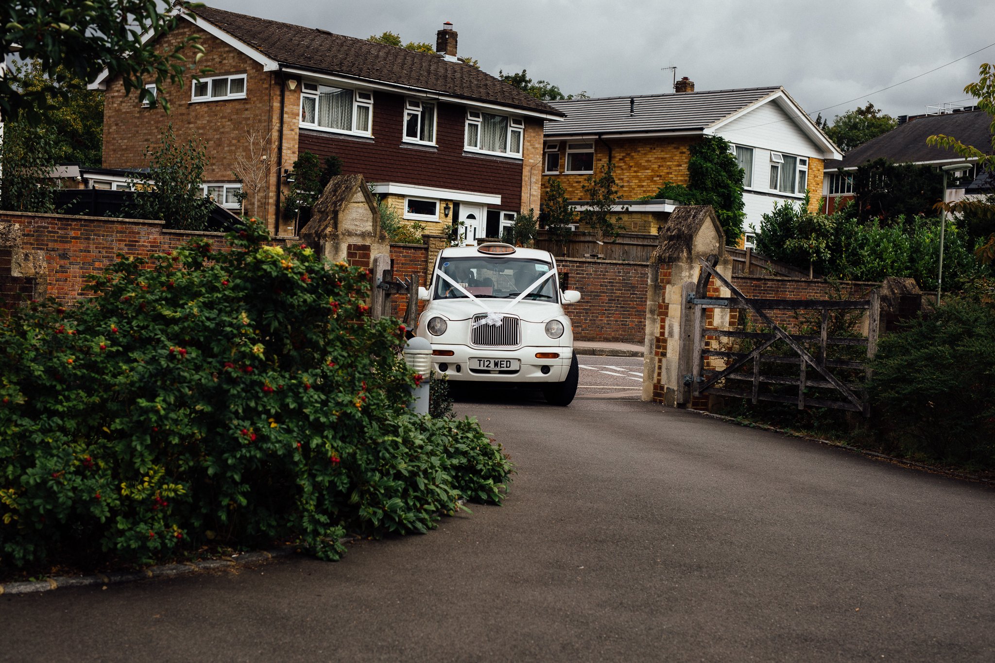  Bridal car arrives at The Holy Family Church in Reigate 