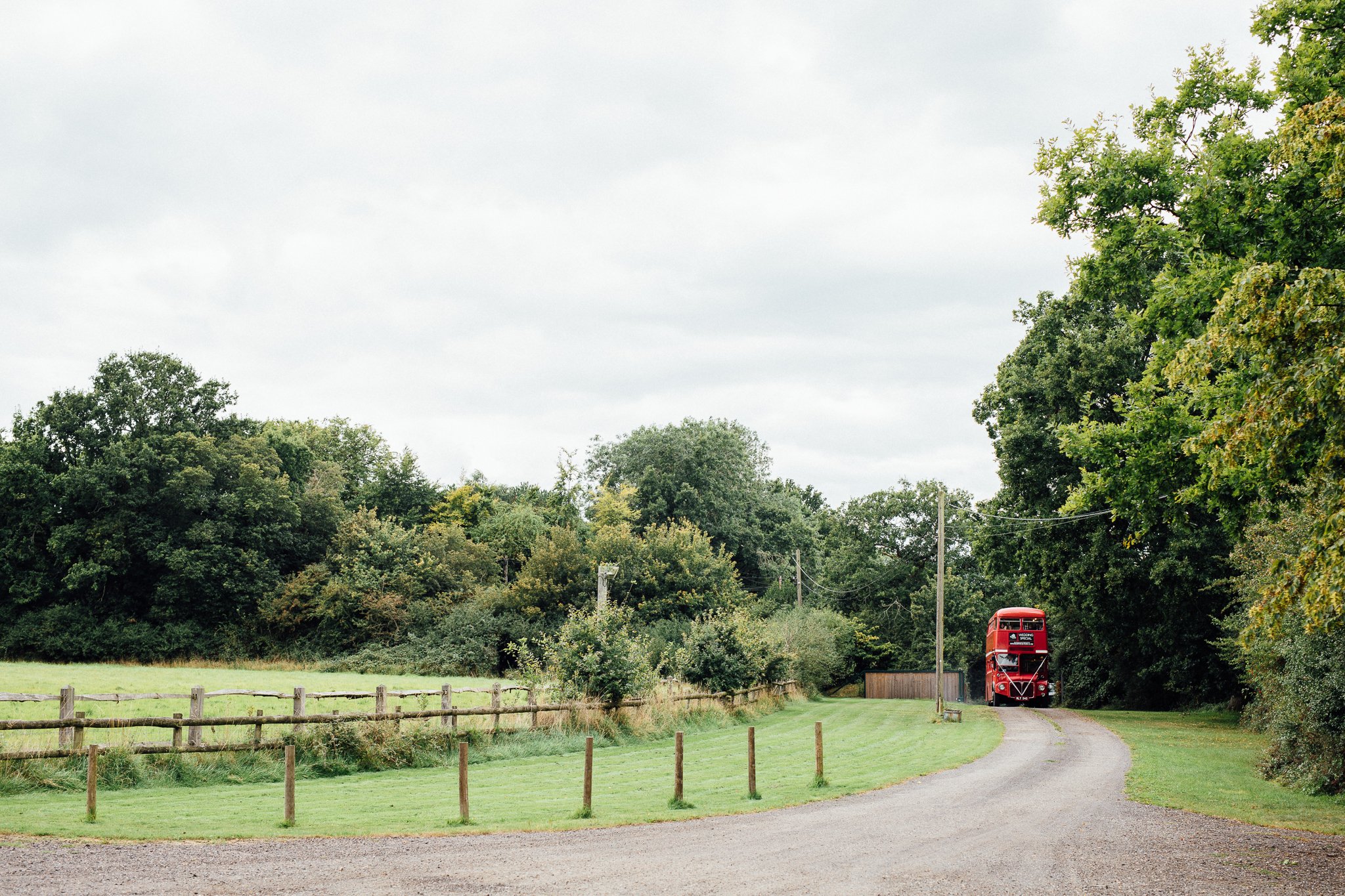  Wedding bus approaches Gildings Barns in Newdigate Surrey 