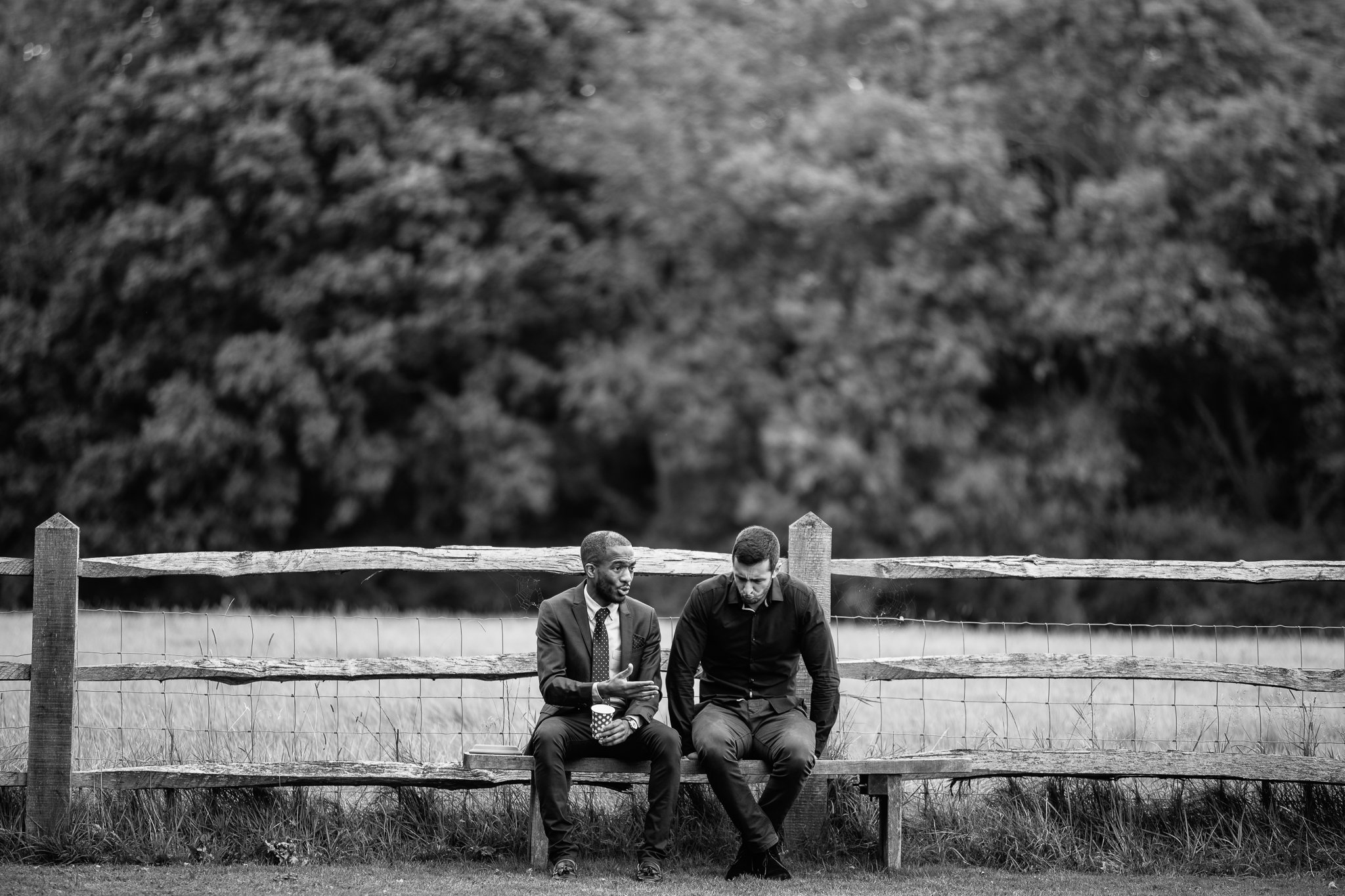  Two men talk at Gildings Barns in Newdigate Surrey 