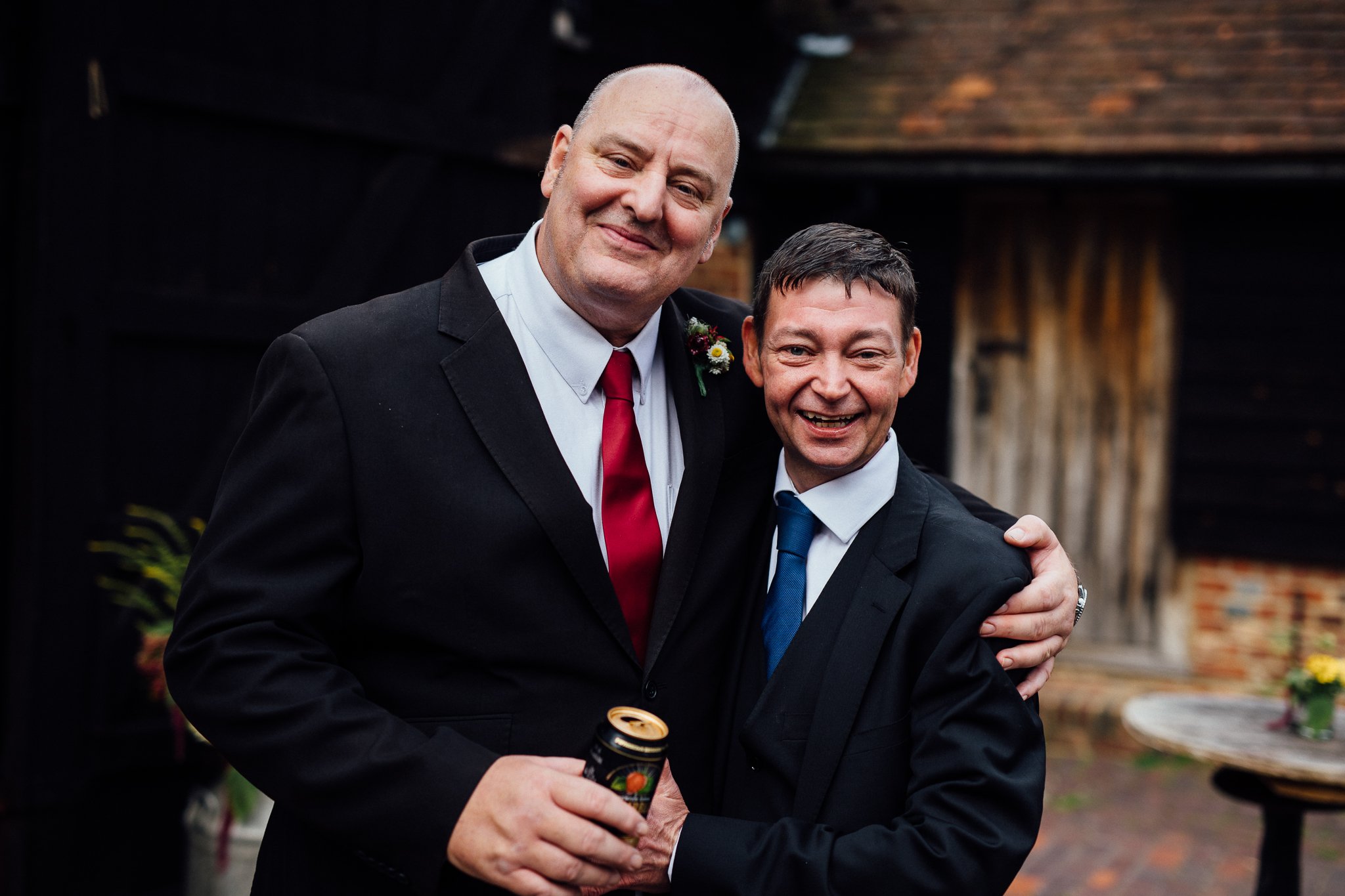  Two men pose at Gildings Barns in Newdigate Surrey 