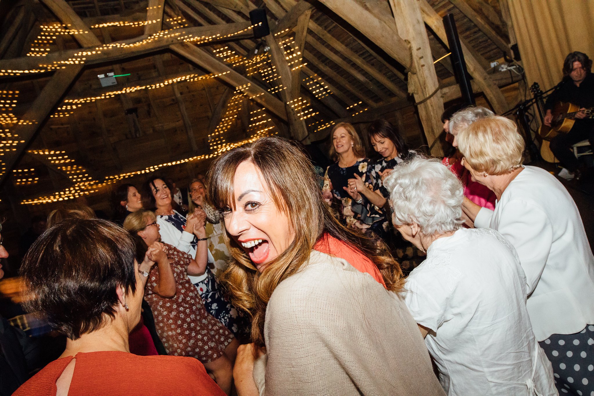  A female guest looks back in delight. 