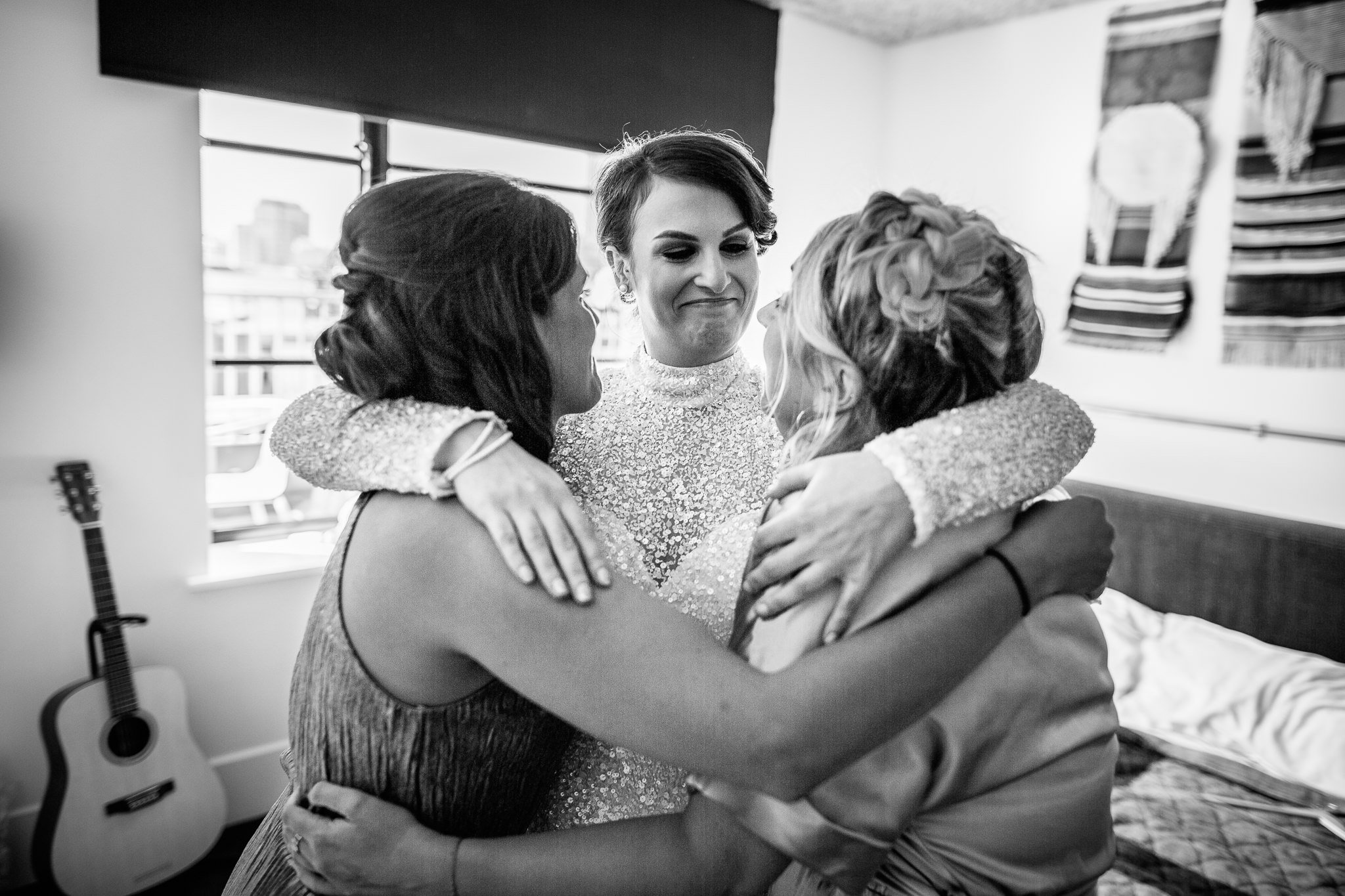  Bride hugs her friends 