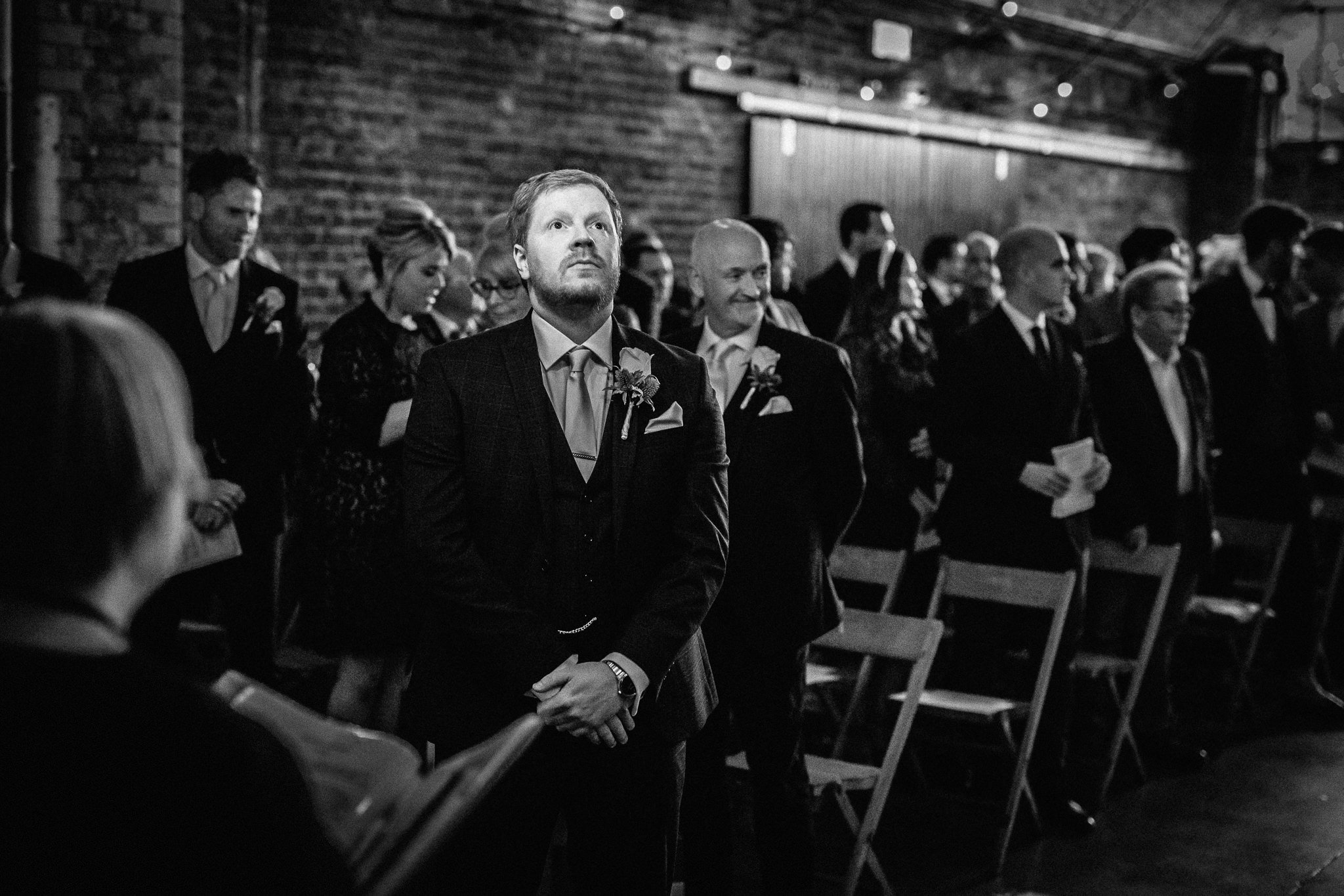  Groom looks pensive at Shoreditch Studios 