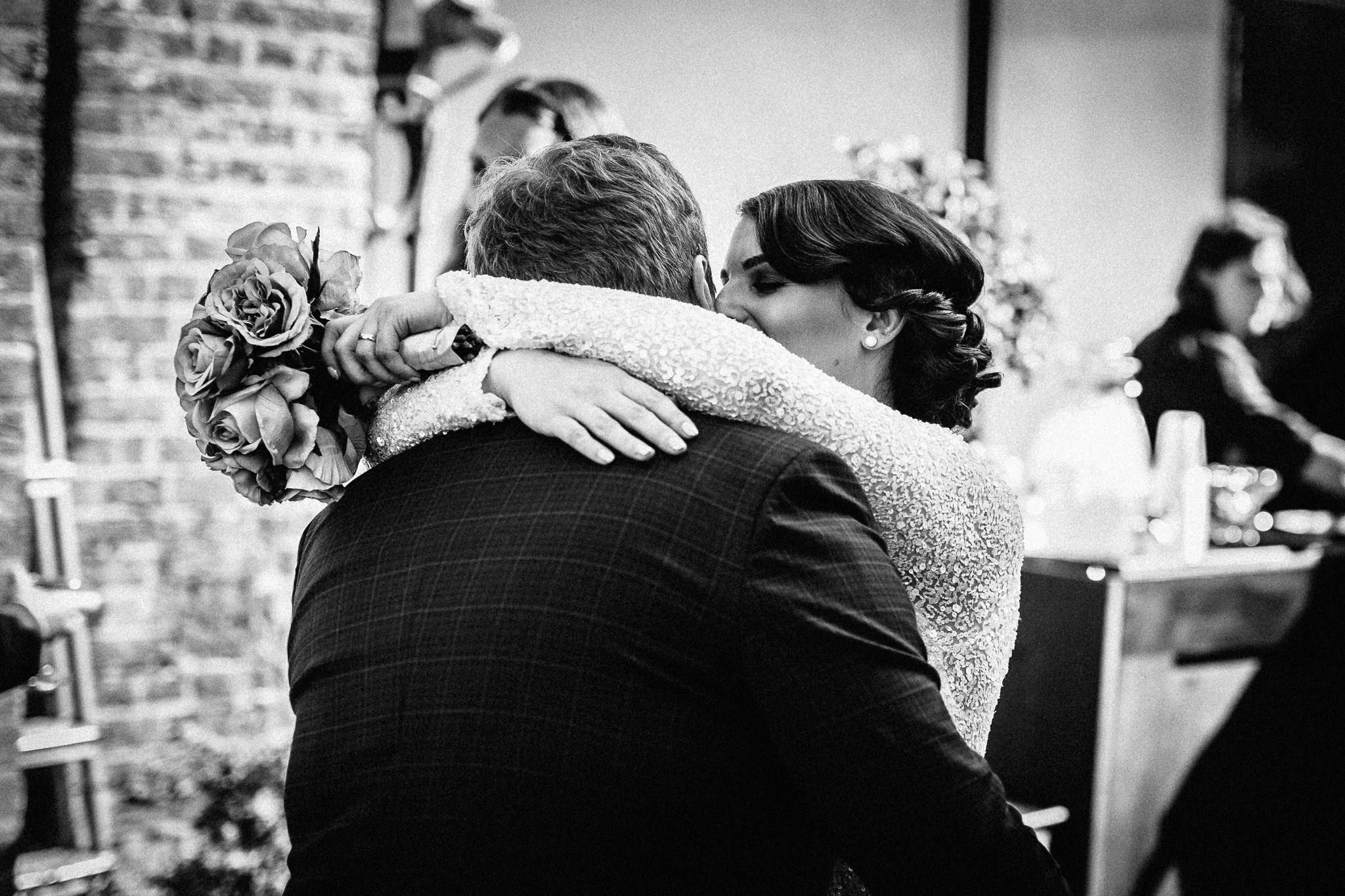  Bride hugging the Groom. 