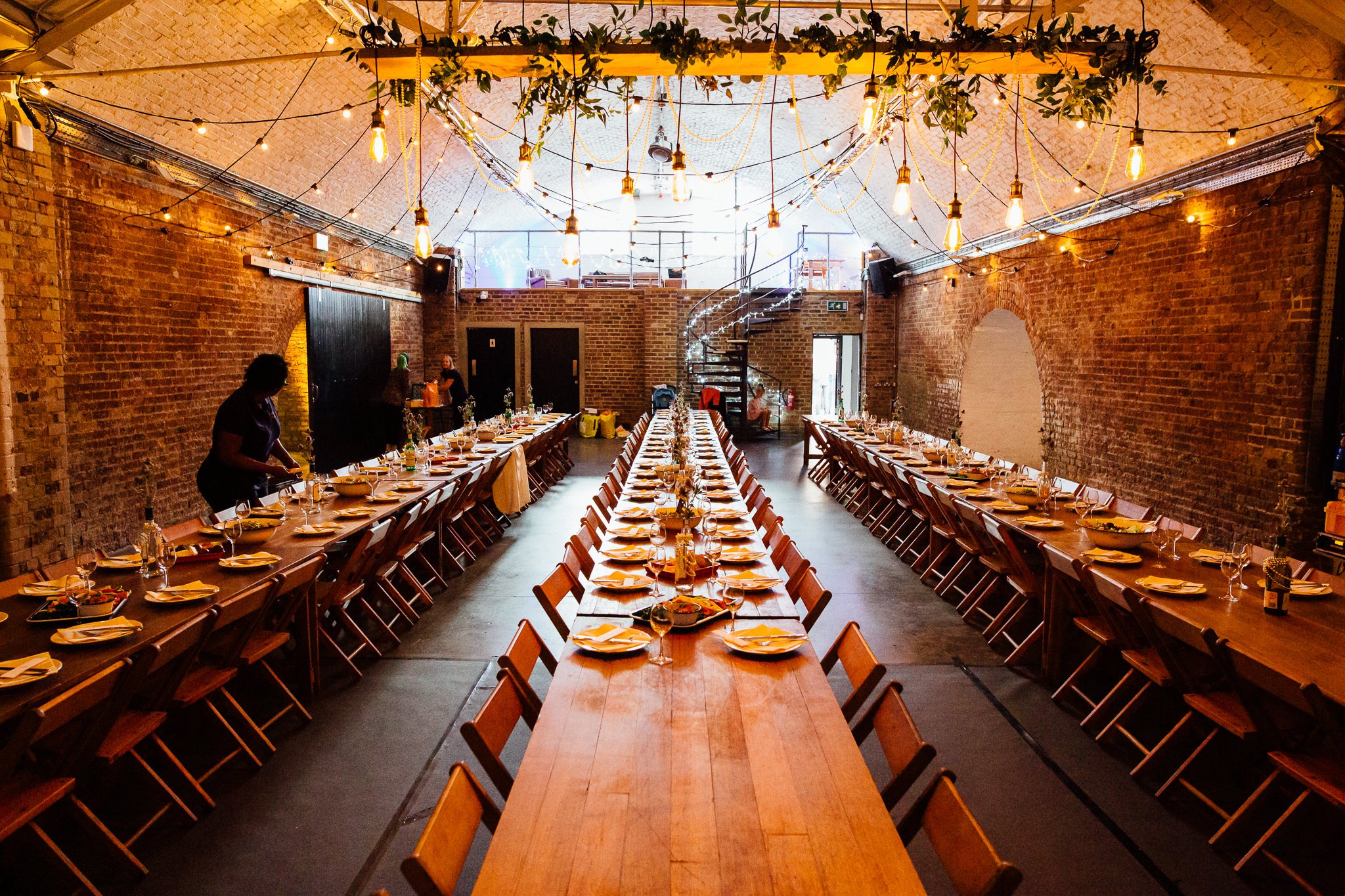  Tables being laid for the wedding breakfast. 