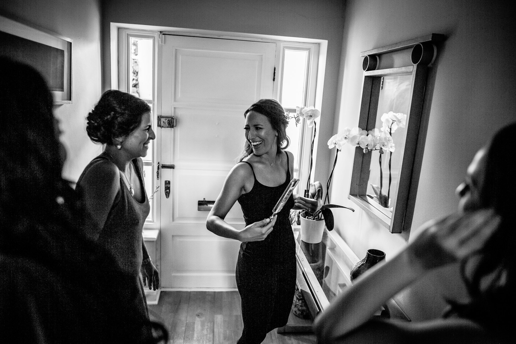  The bride smiles at her maid of honour 