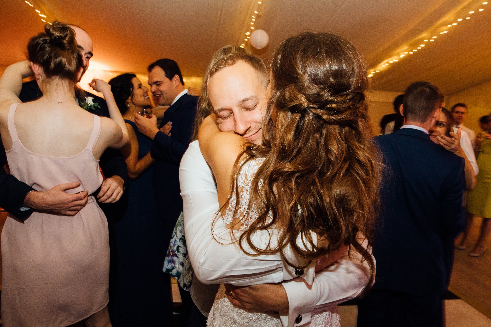  Groom hugs the bride on the dancefloor at Chiswick House 