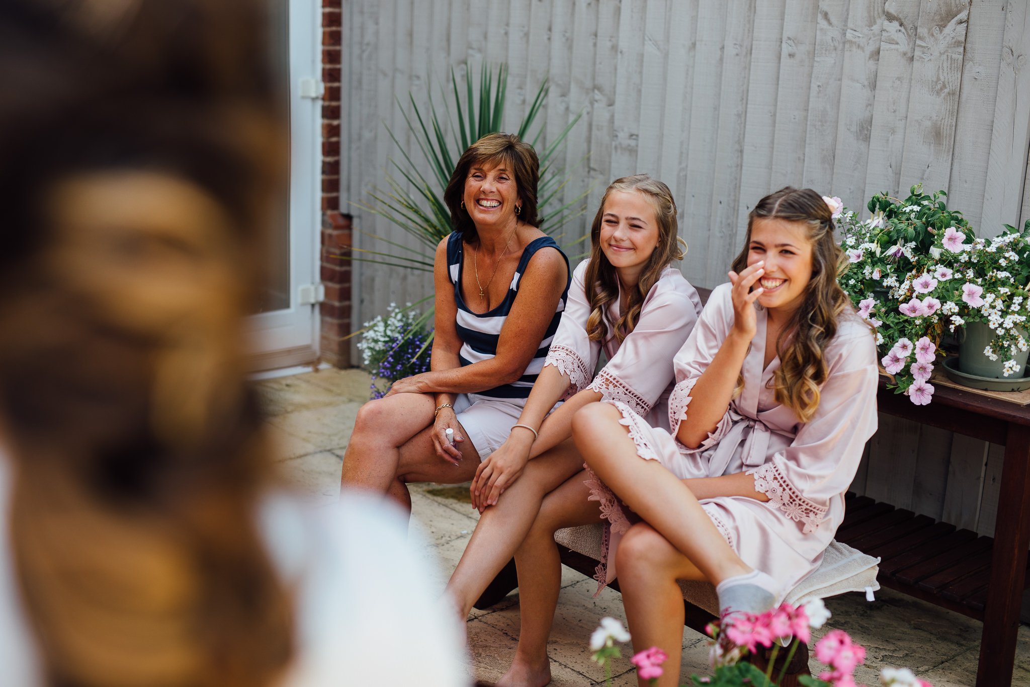  Bride’s family smiling at the Briide 