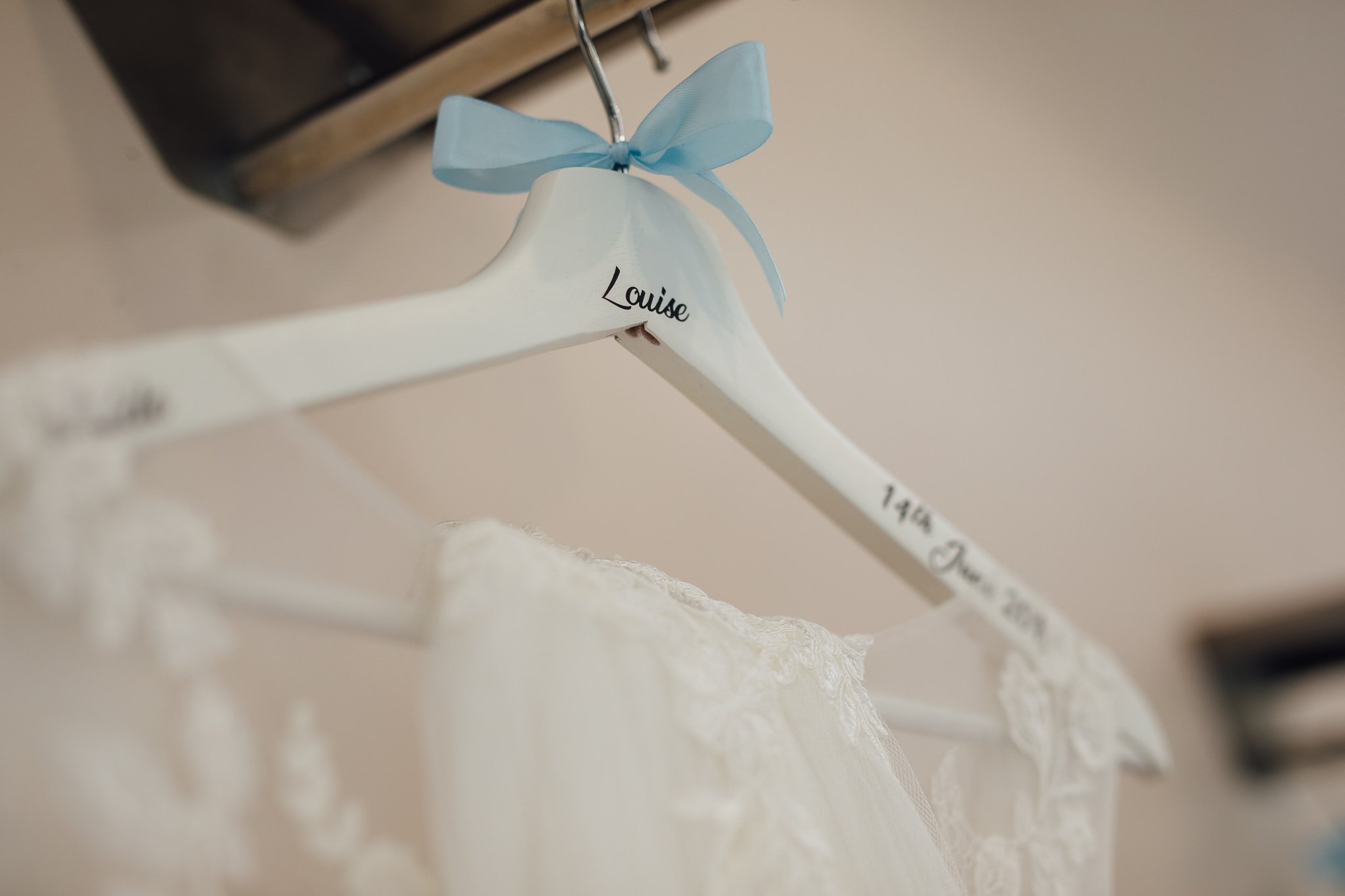  Dress hanger showing the name of the Bride 