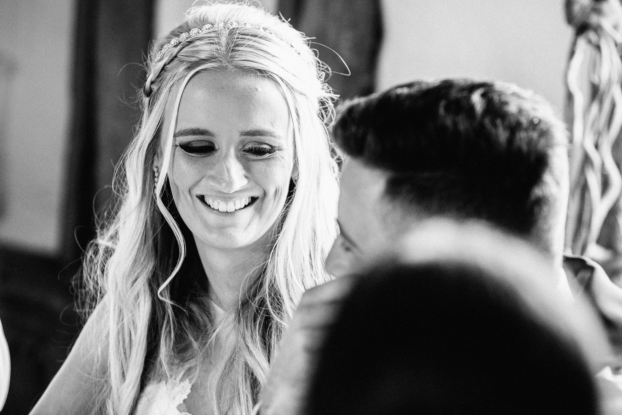  Bride smiling at the Groom 
