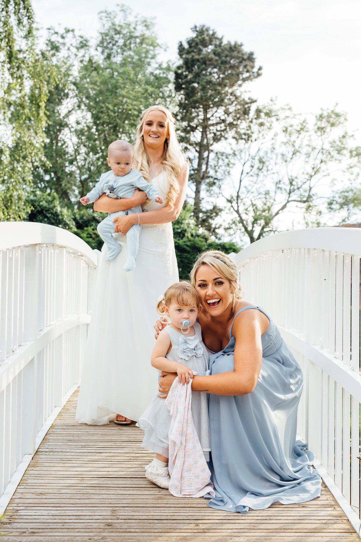  Bride and her maid of honour with their children  