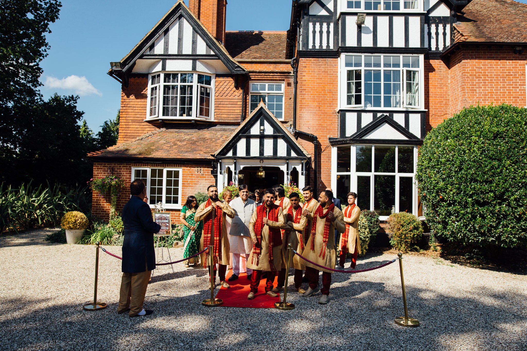  Wedding party waits outside Trunkwell House in Berkshire for arrival of Groom 
