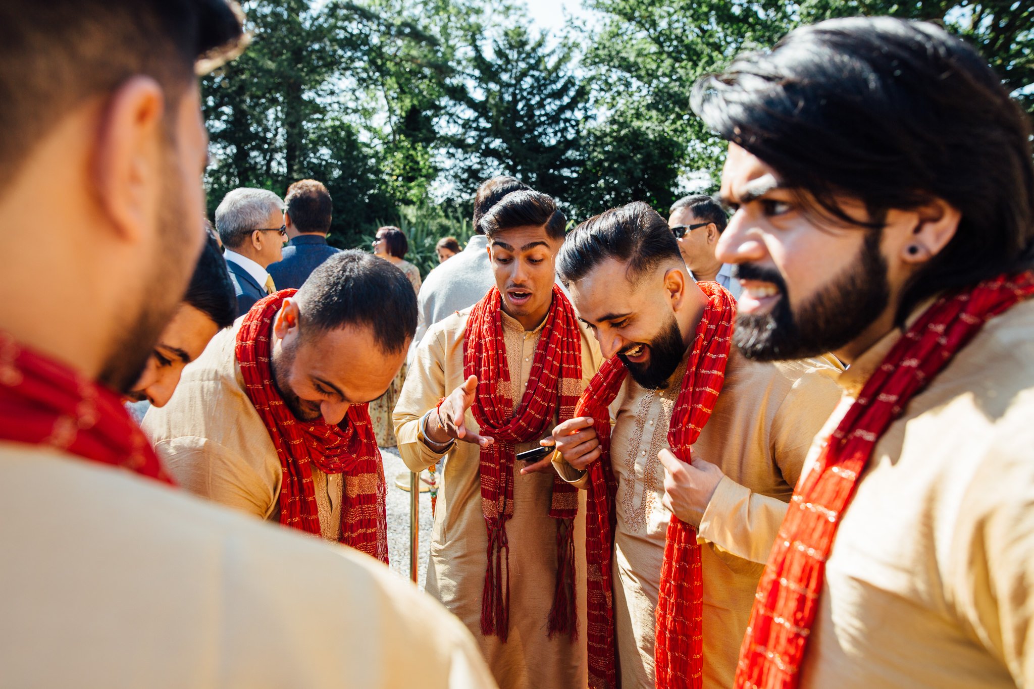  Men joke outside Trunkwell House in Berkshire wearing their traditional Sikh attire 