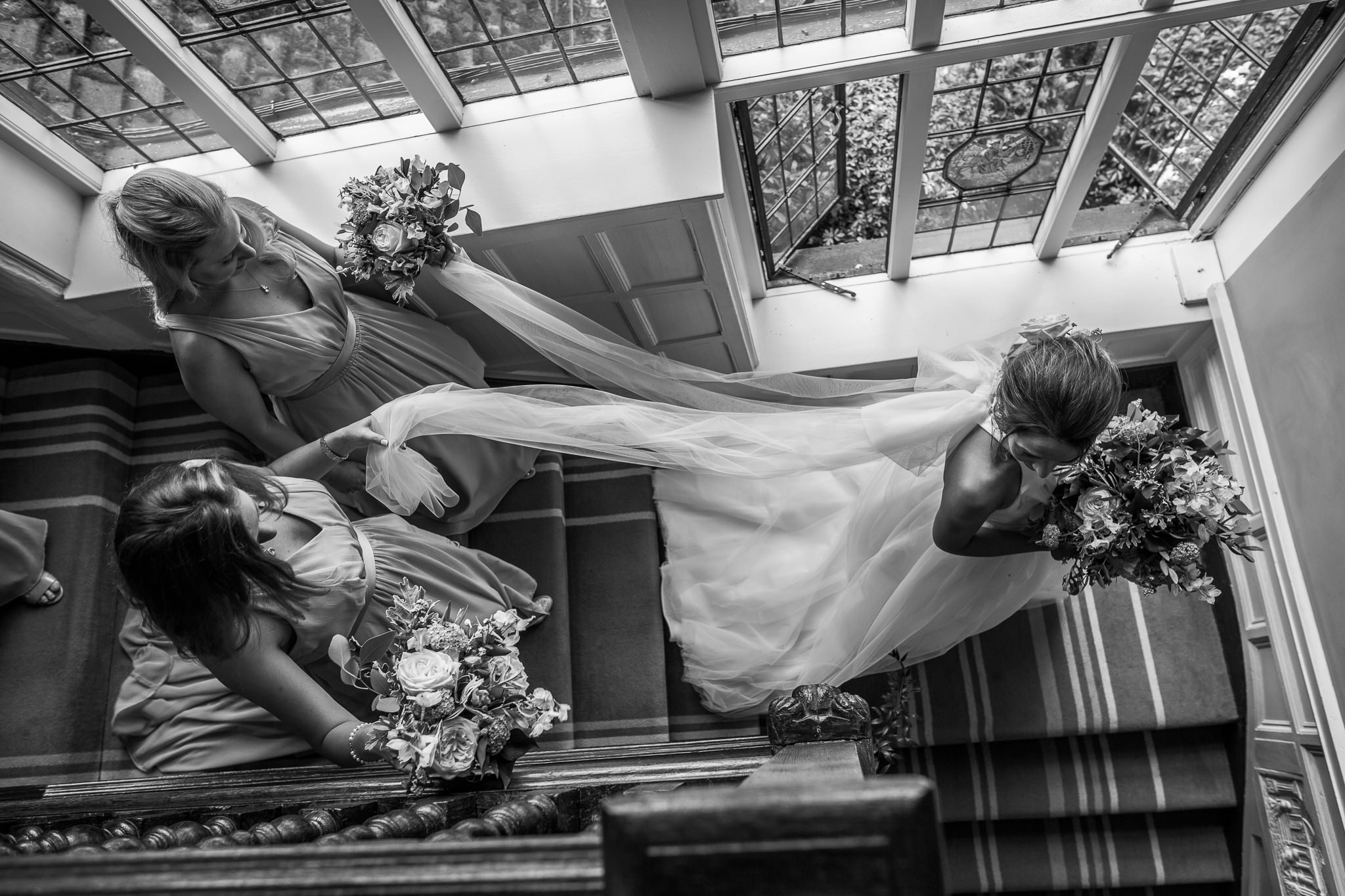  Bride descends the stairs at Laura Ashley The Manor Elstree 