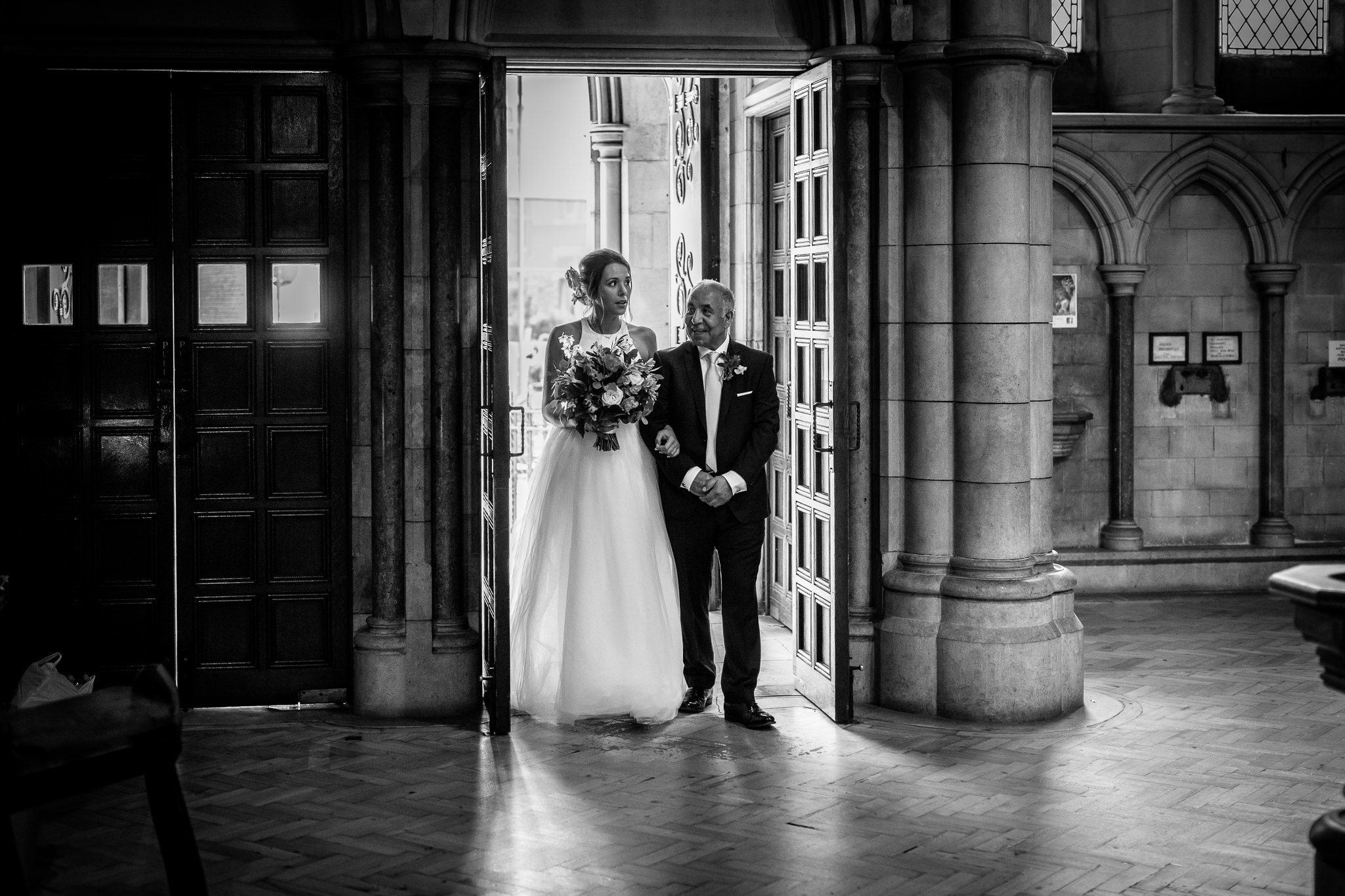  Bride walks into St James Church, Spanish Place Marlyborne with her father 