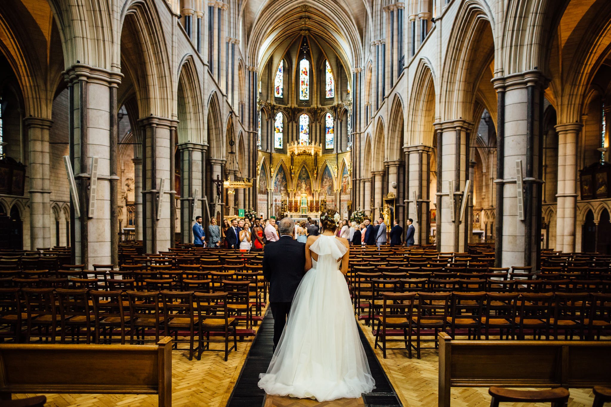  Bride and her father walk down the aisle at St James Church, Spanish Place Marlyborne 
