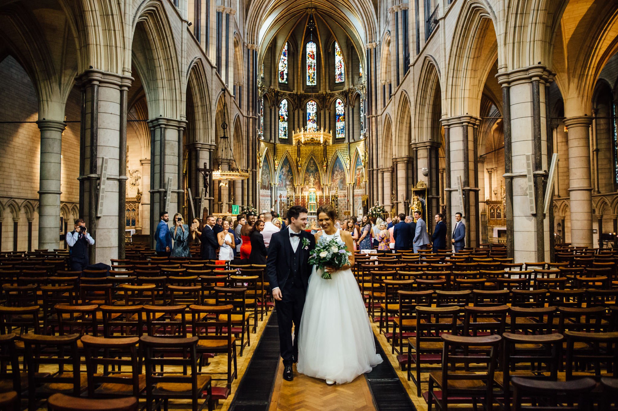  Bride and Groom walk down the aisle at St James Church, Spanish Place Marlyborne 