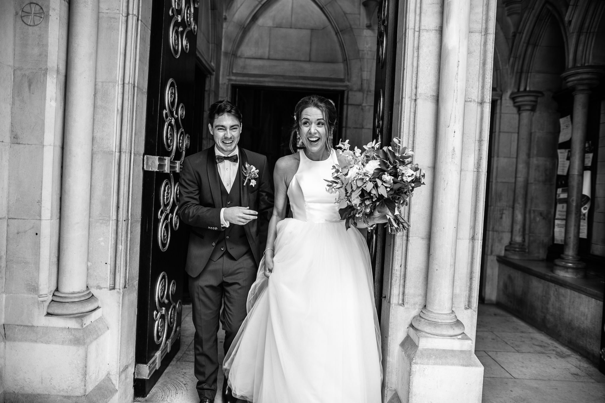  Bride and Groom walk out of St James Church, Spanish Place Marlyborne as a married couple 
