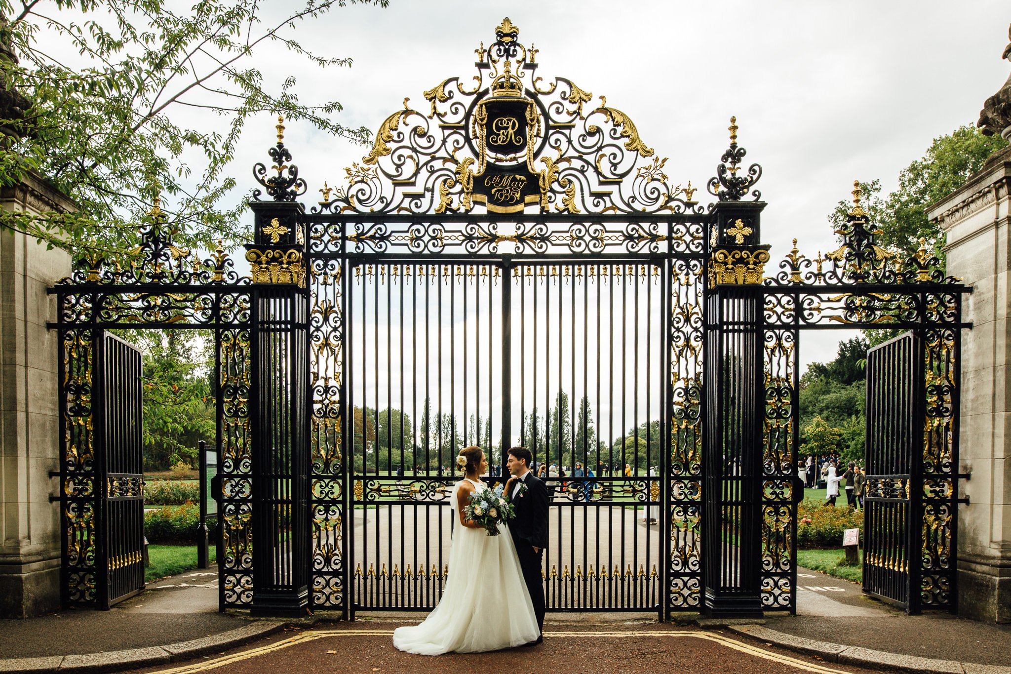  Bride and Groom outside a royal park 