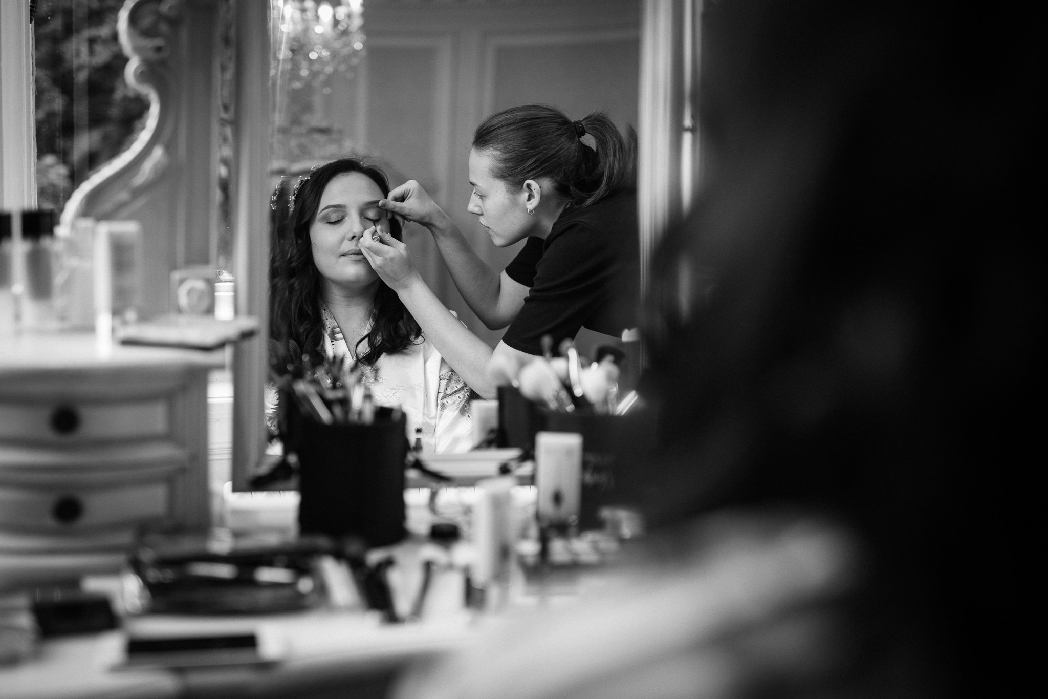  Bride having makeup applied at Warren House Hotel Kingston upon Thames 