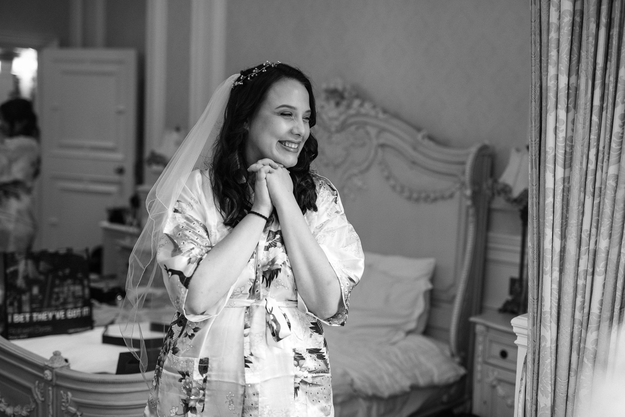  Bride smiling at Warren House Hotel Kingston upon Thames 