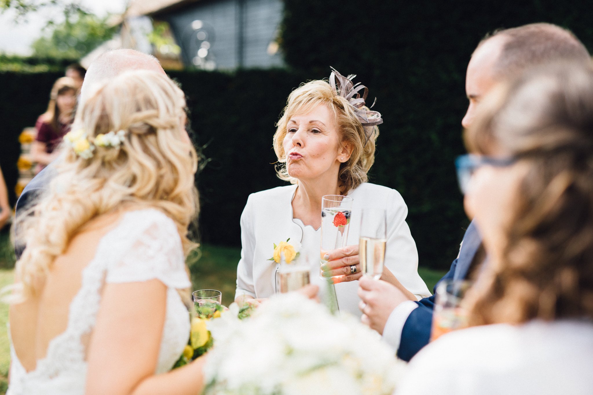  Mother of the bride does a long-range kiss 