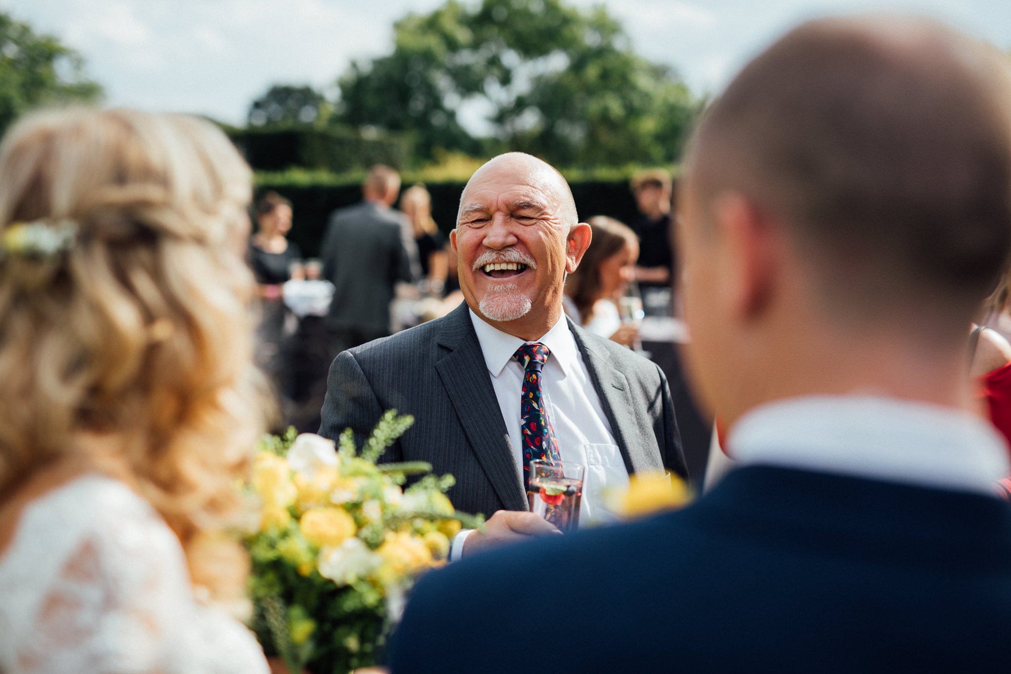 Wedding guest laughing 