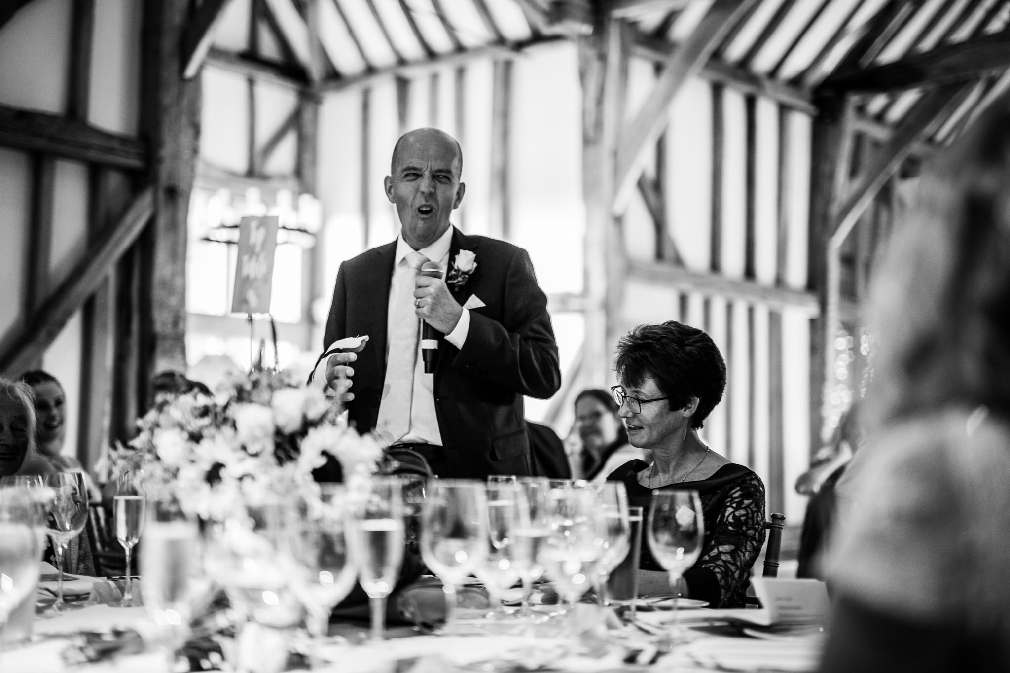  Father of the Groom pulling a funny face during the speeches 