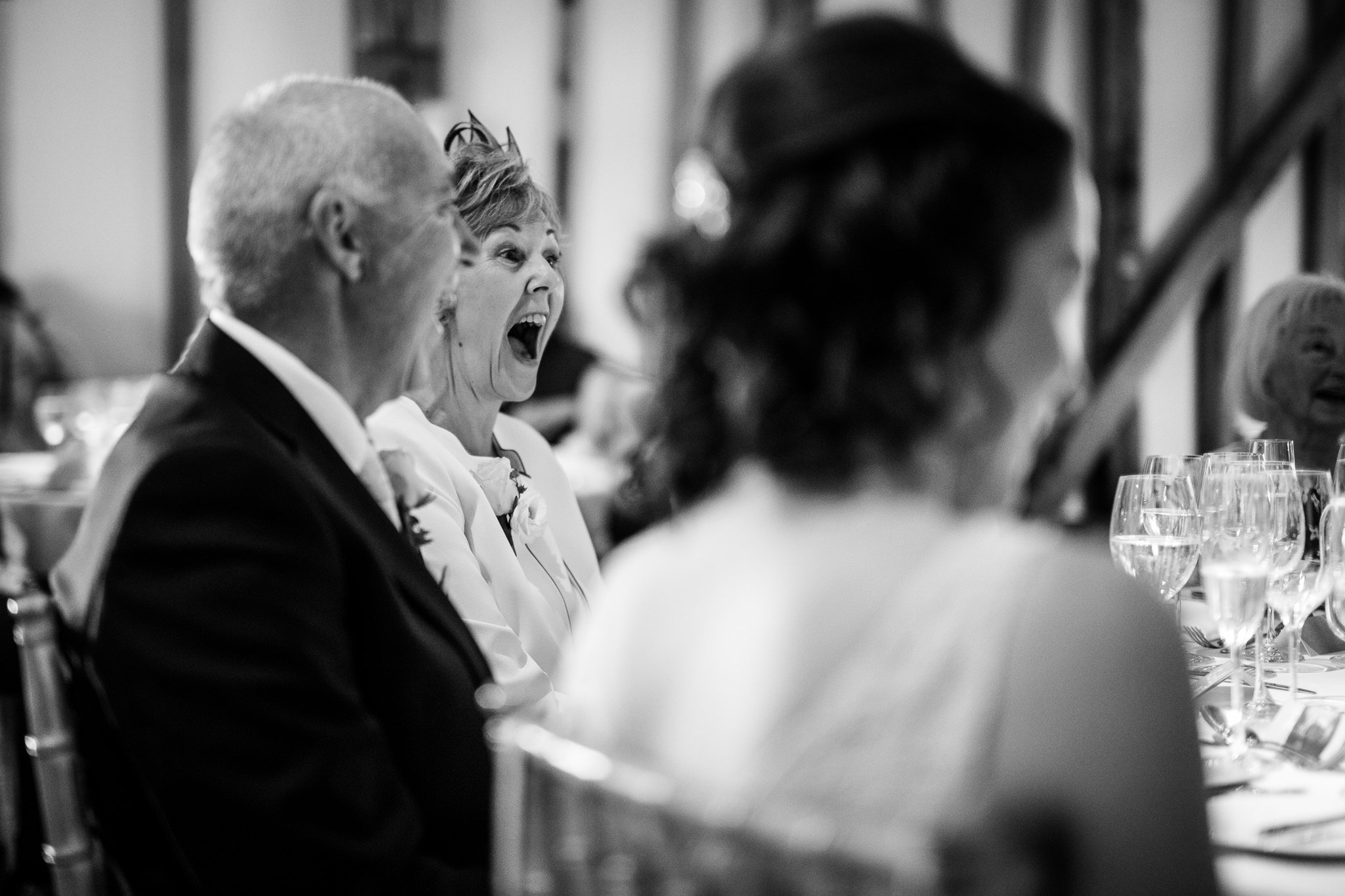  A surprised reaction during the speeches of a wedding guest 