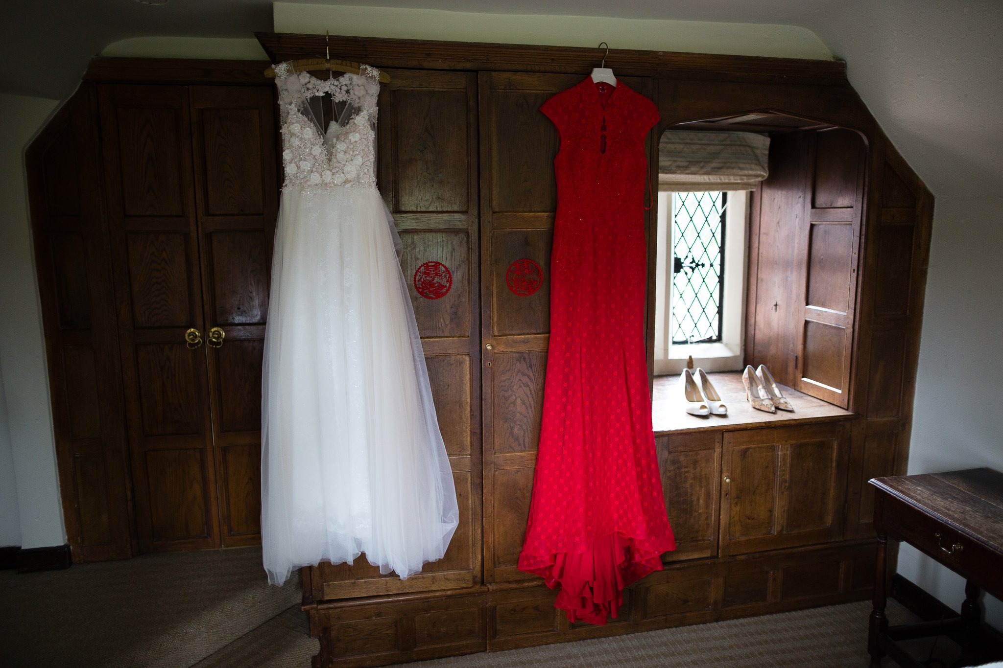  Wedding dress hanging up at Great Fosters Egham 