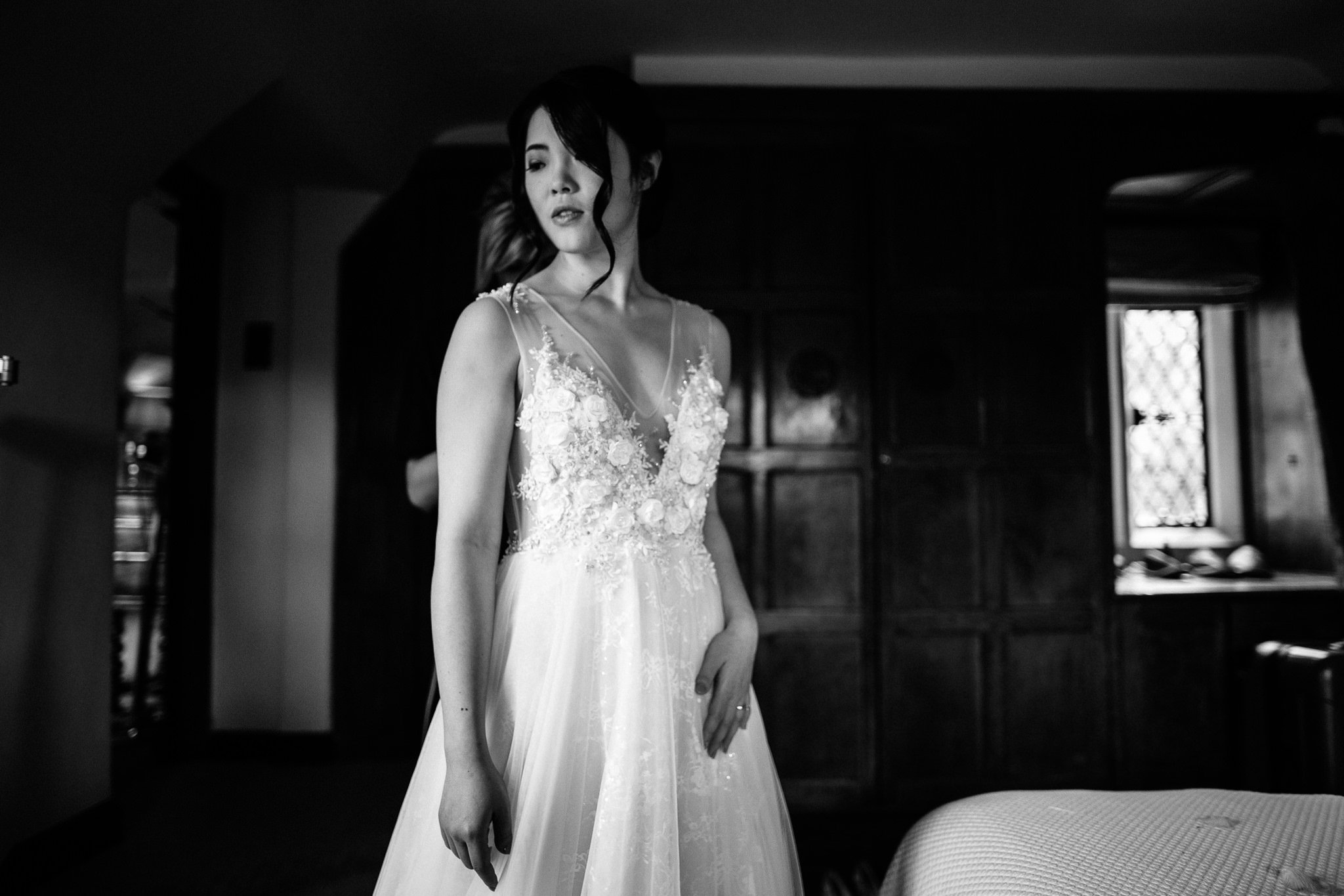  Bride in her wedding dress at Great Fosters Egham 