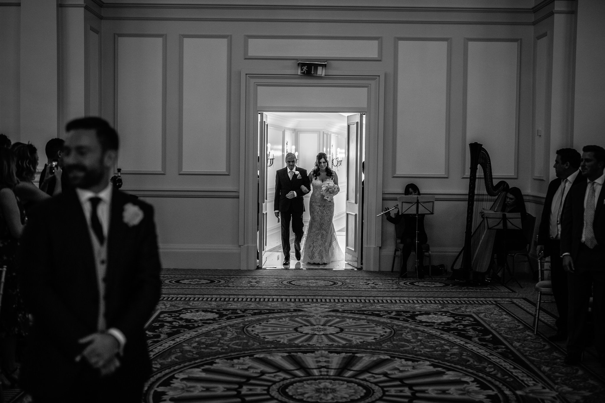  Bride enters the ceremony room at The Landmark London hotel 