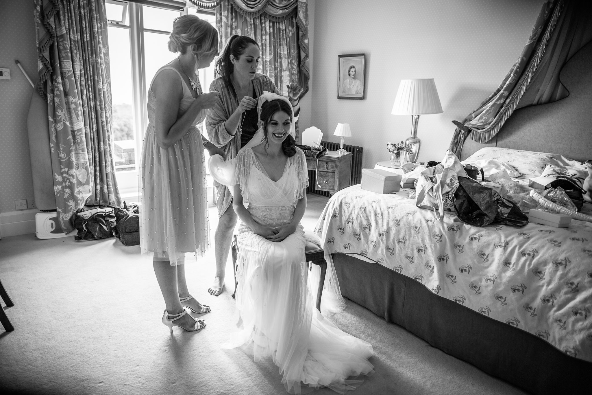  Final touches are applied to the bride’s hair before her wedding 