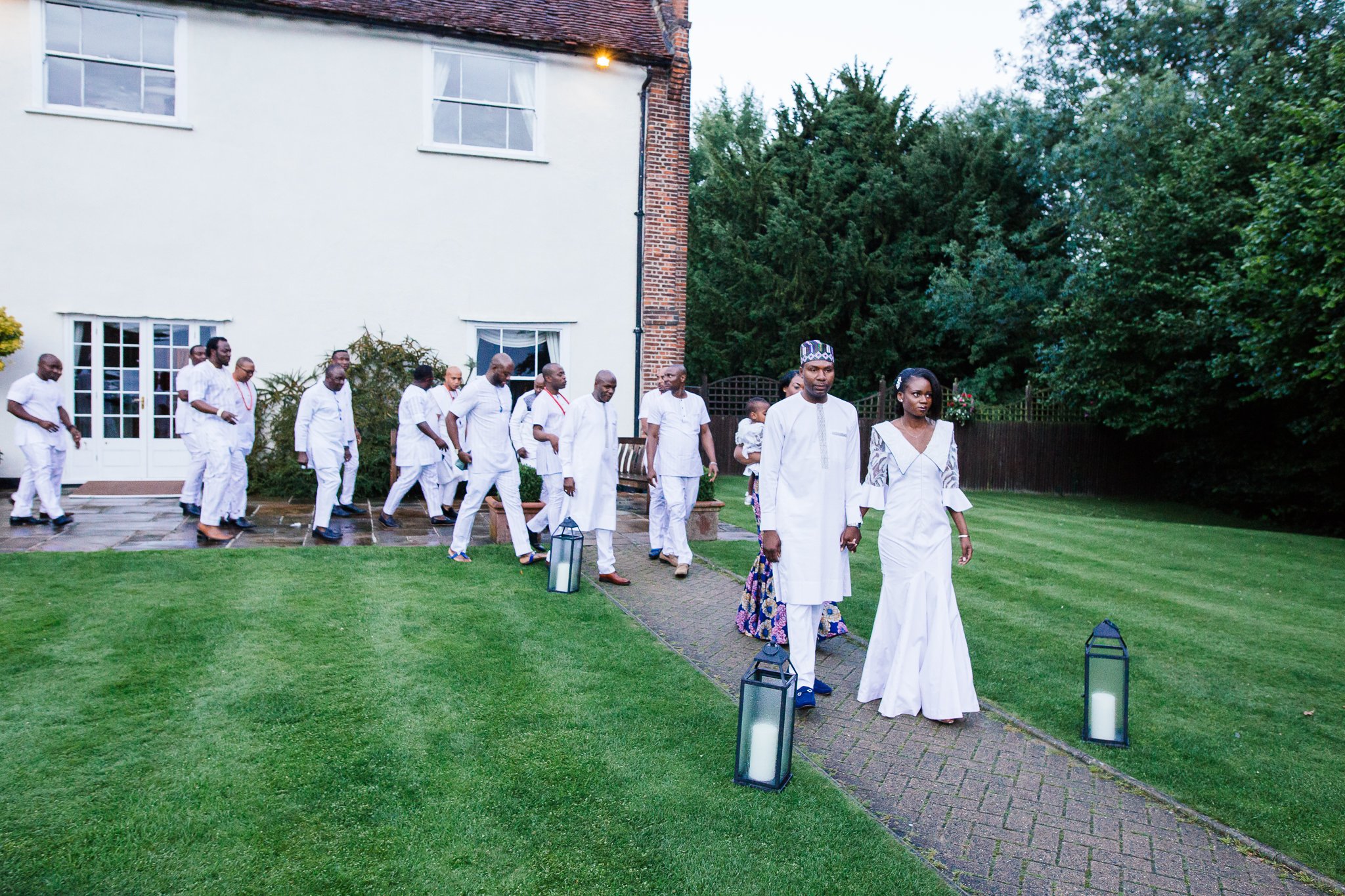  Bride and Groom in traditional Nigerian attire at Newland Hall Essex 