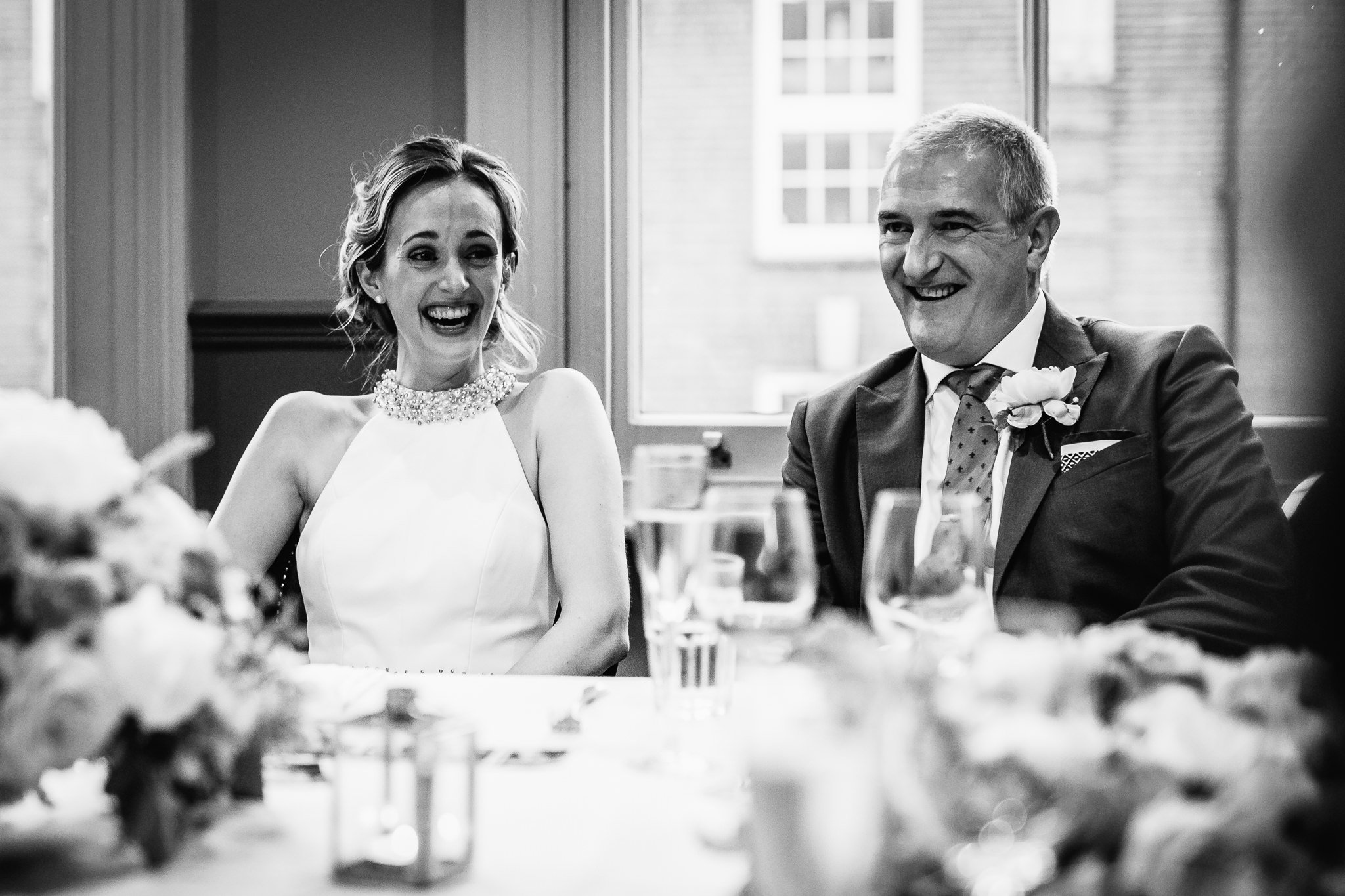  Bride and her father laughing 