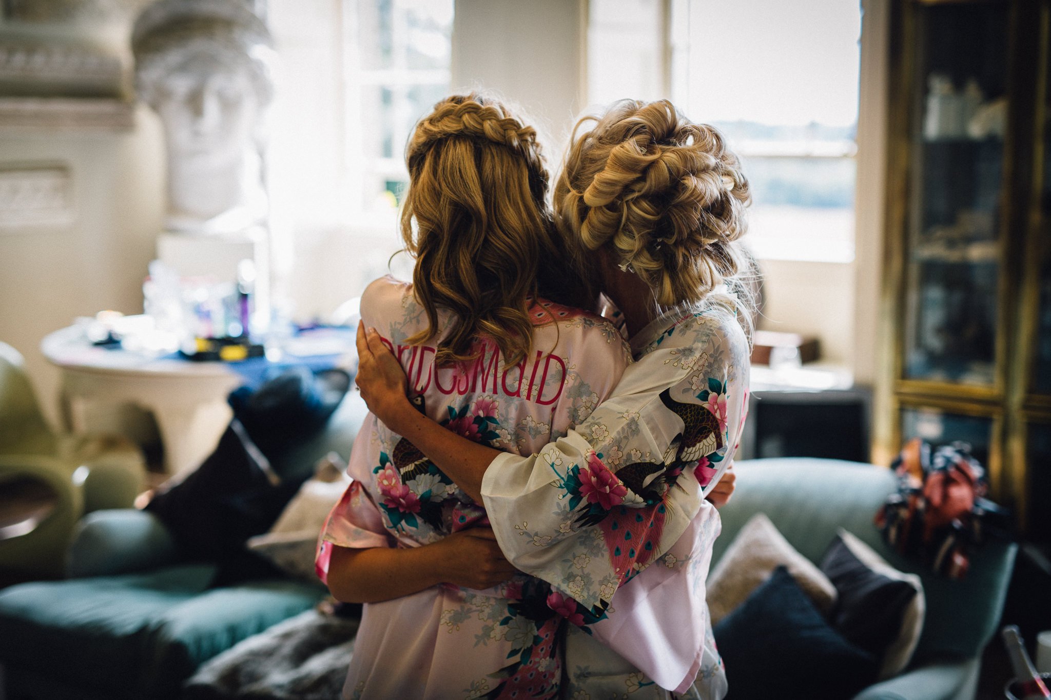  Bride and Bridesmaids hug 